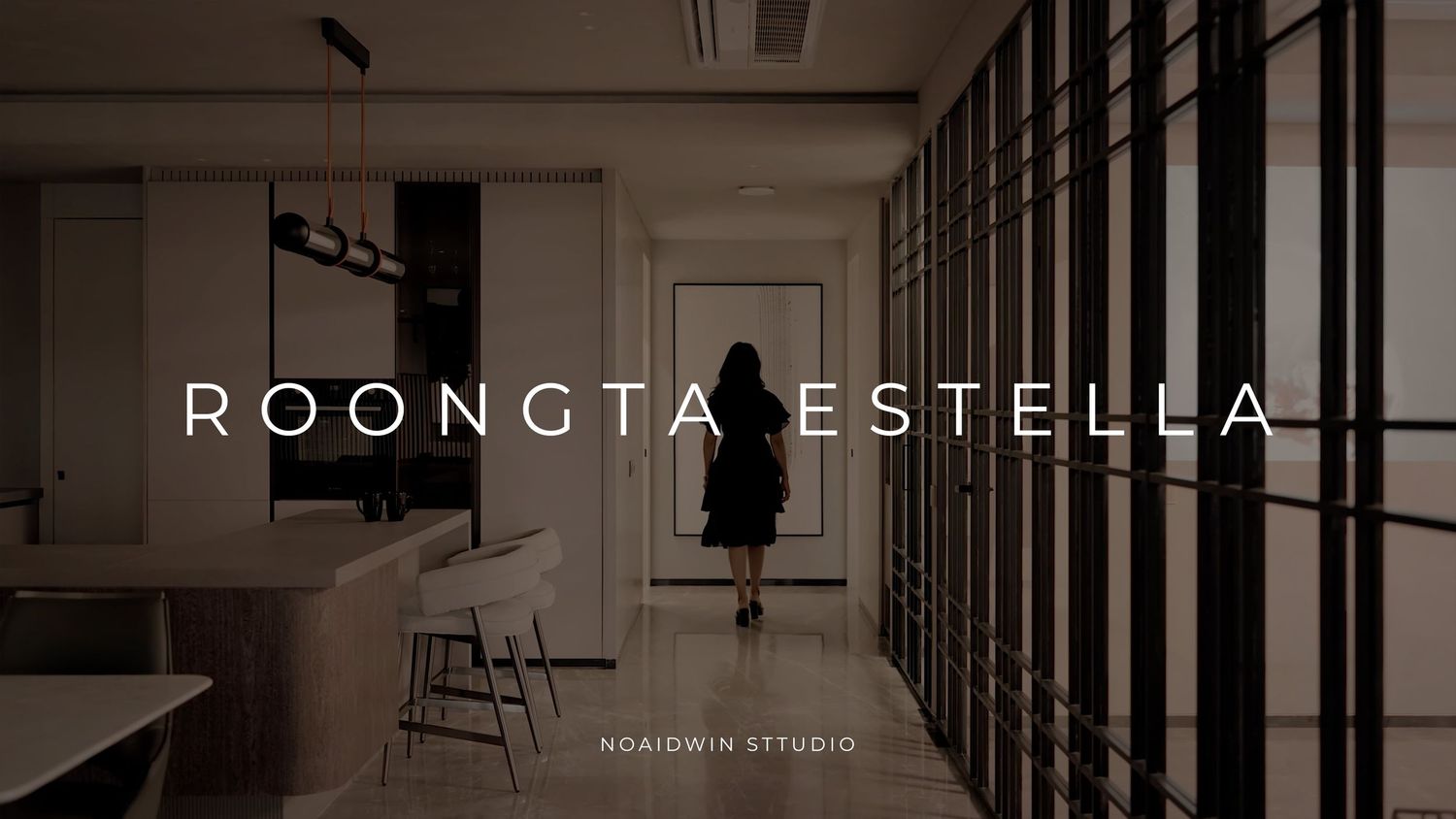 Modern luxury interior hallway of Roongta Estella designed by Noaidwin Studio with dark accents and elegant lighting.