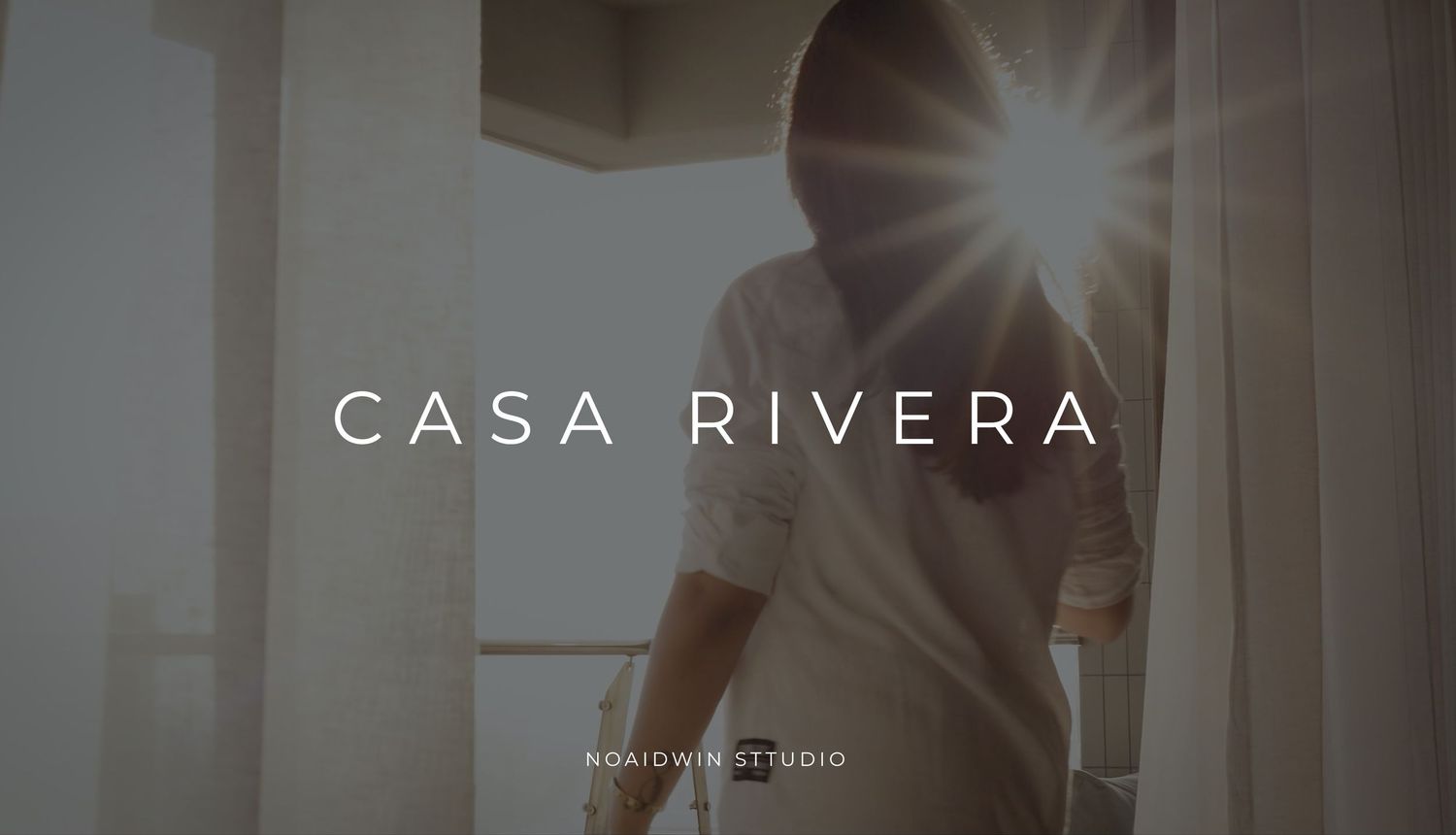 Silhouette of a person standing in bright sunlight at Casa Rivera, a luxury property by Noaidwin Studio.