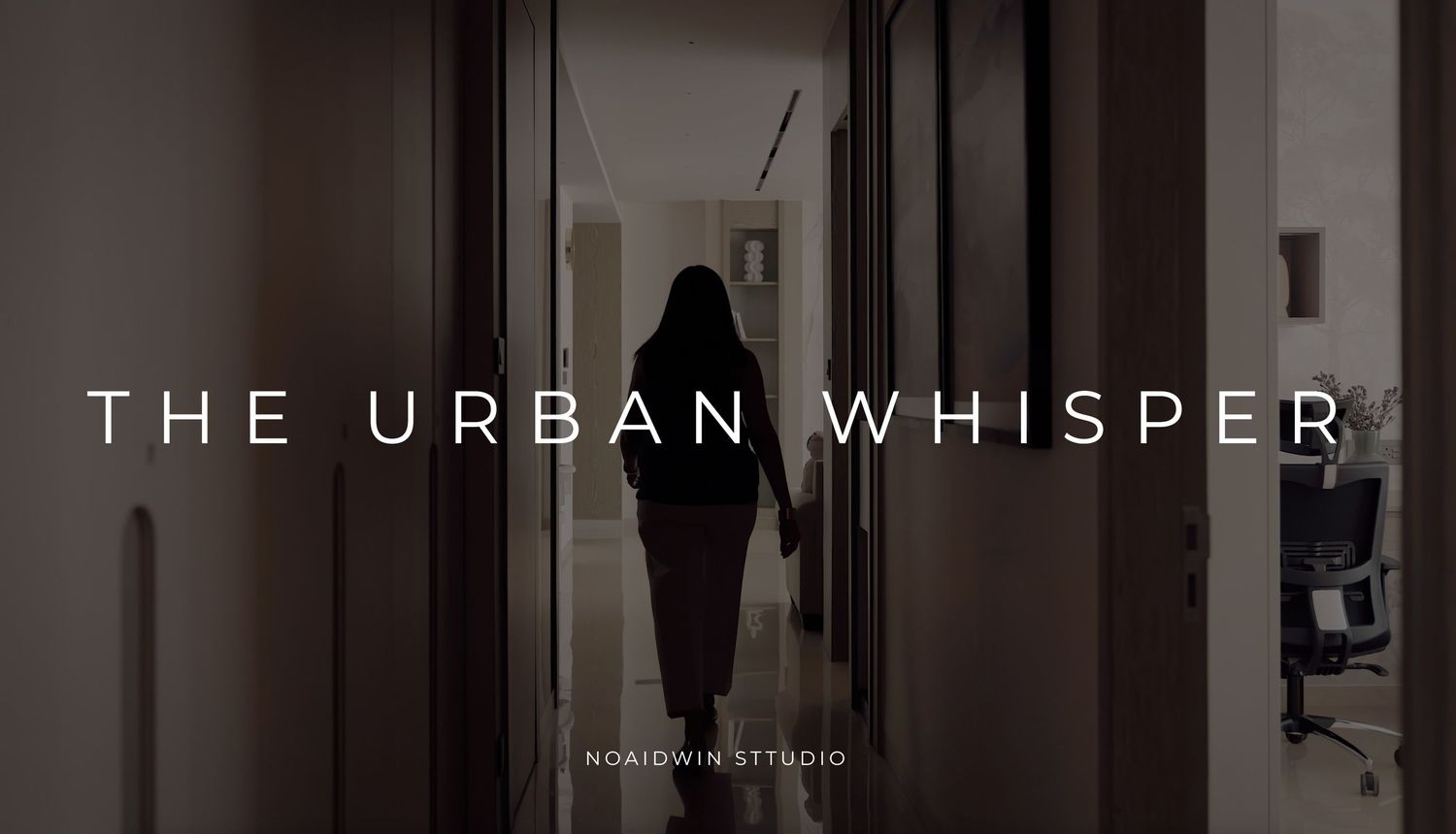 A silhouetted figure walks down a dimly lit hallway in The Urban Whisper, a film by Nordwin Studio.
