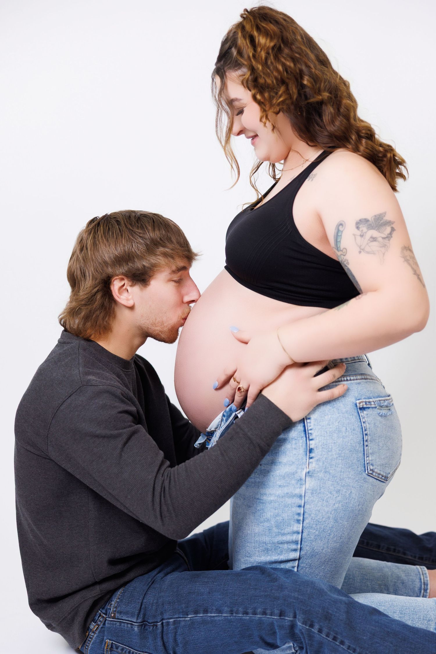 Four progressive photos showing a couple in intimate poses against a white background.