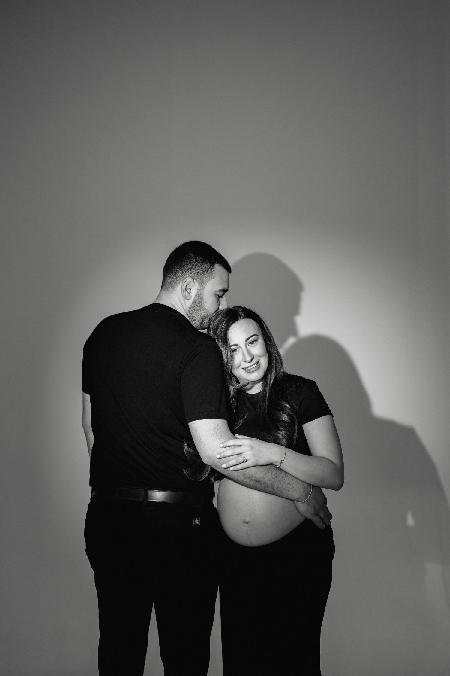 Toronto maternity photographer capturing spotlight studio portraits