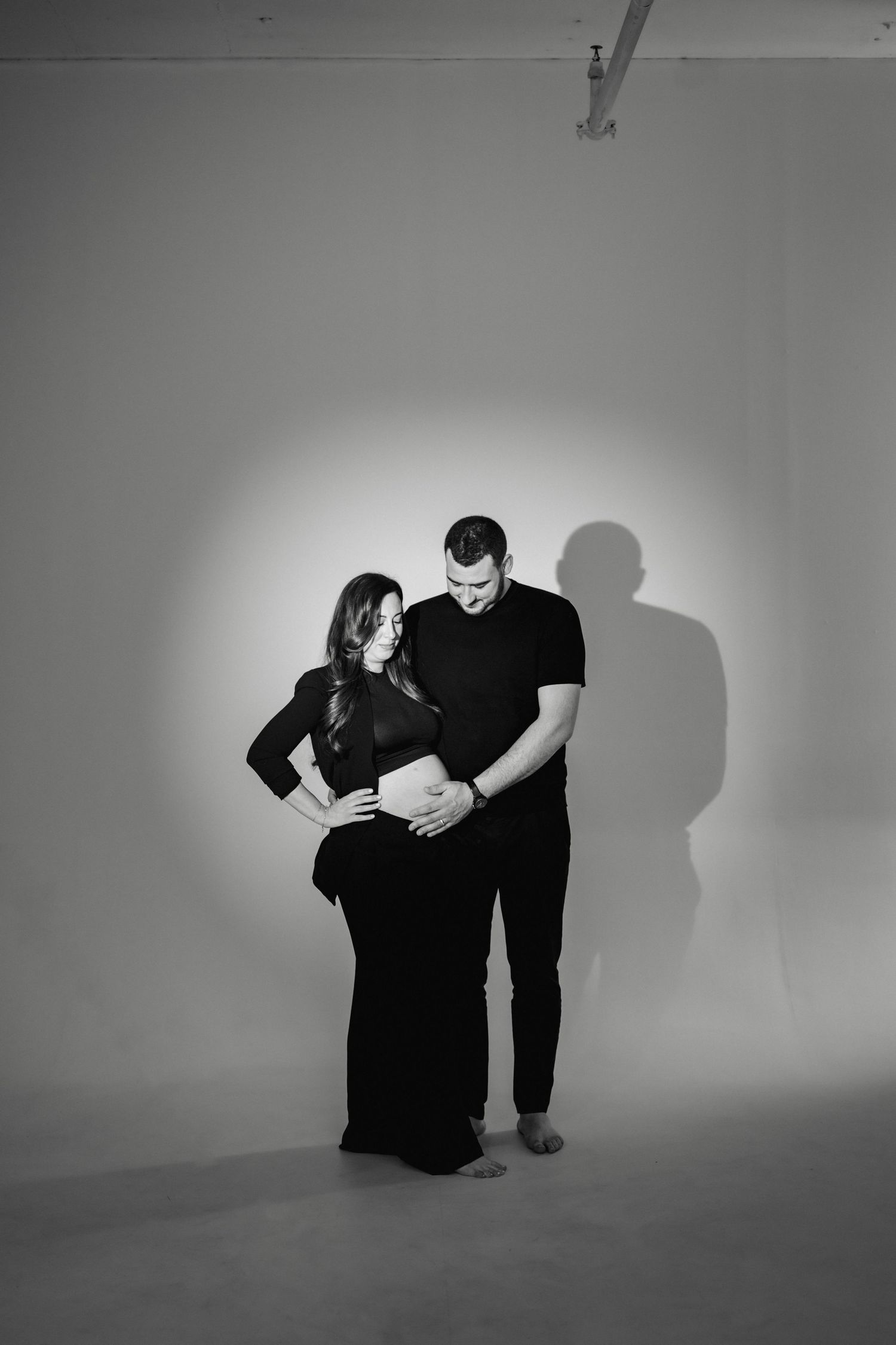 Toronto maternity photographer capturing spotlight studio portraits