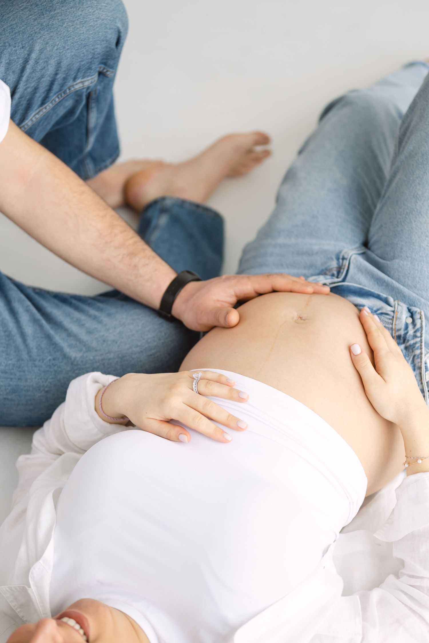 Editorial maternity session at Icon Studio Toronto with clean white backdrop