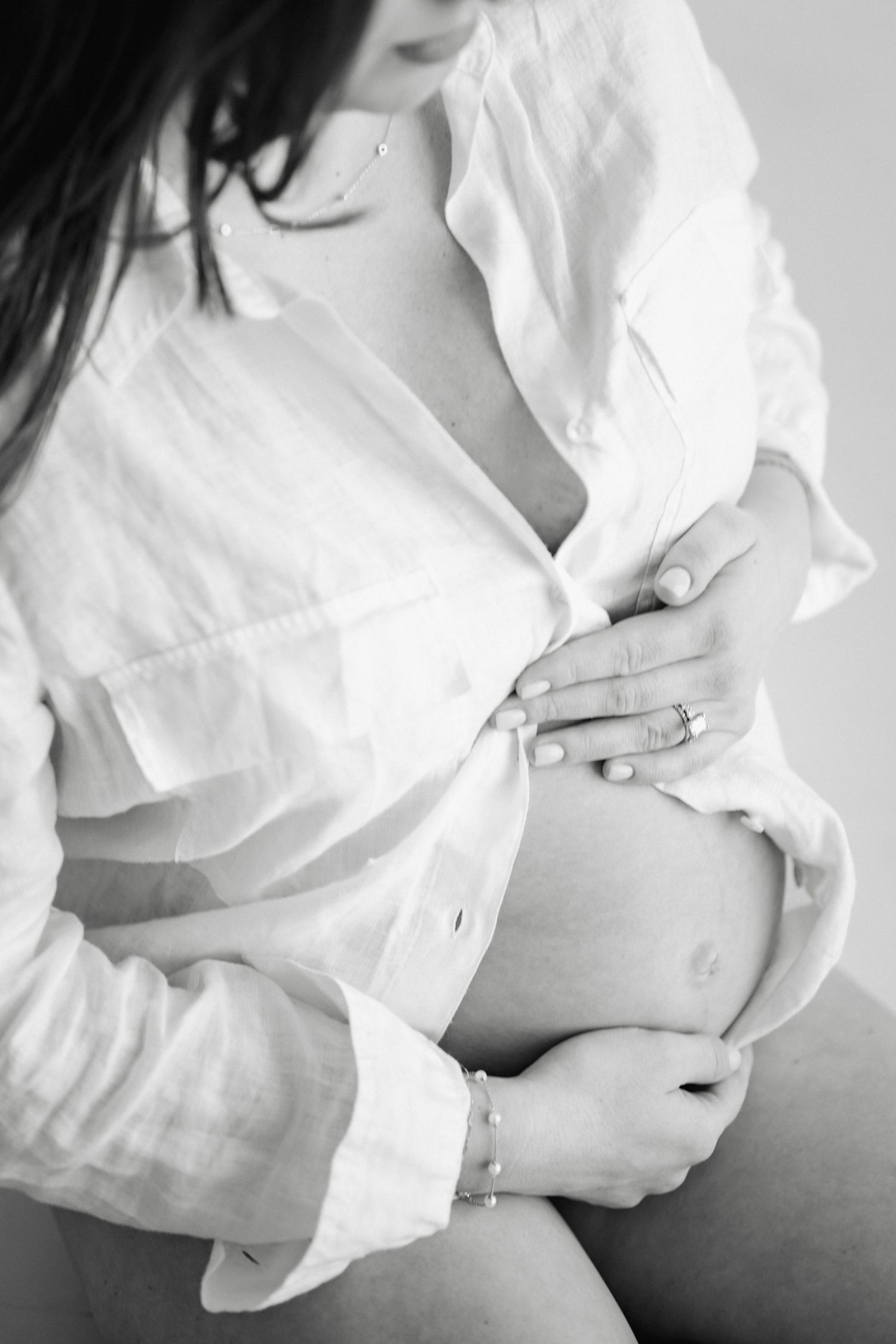 Toronto maternity photographer capturing spotlight studio portraits