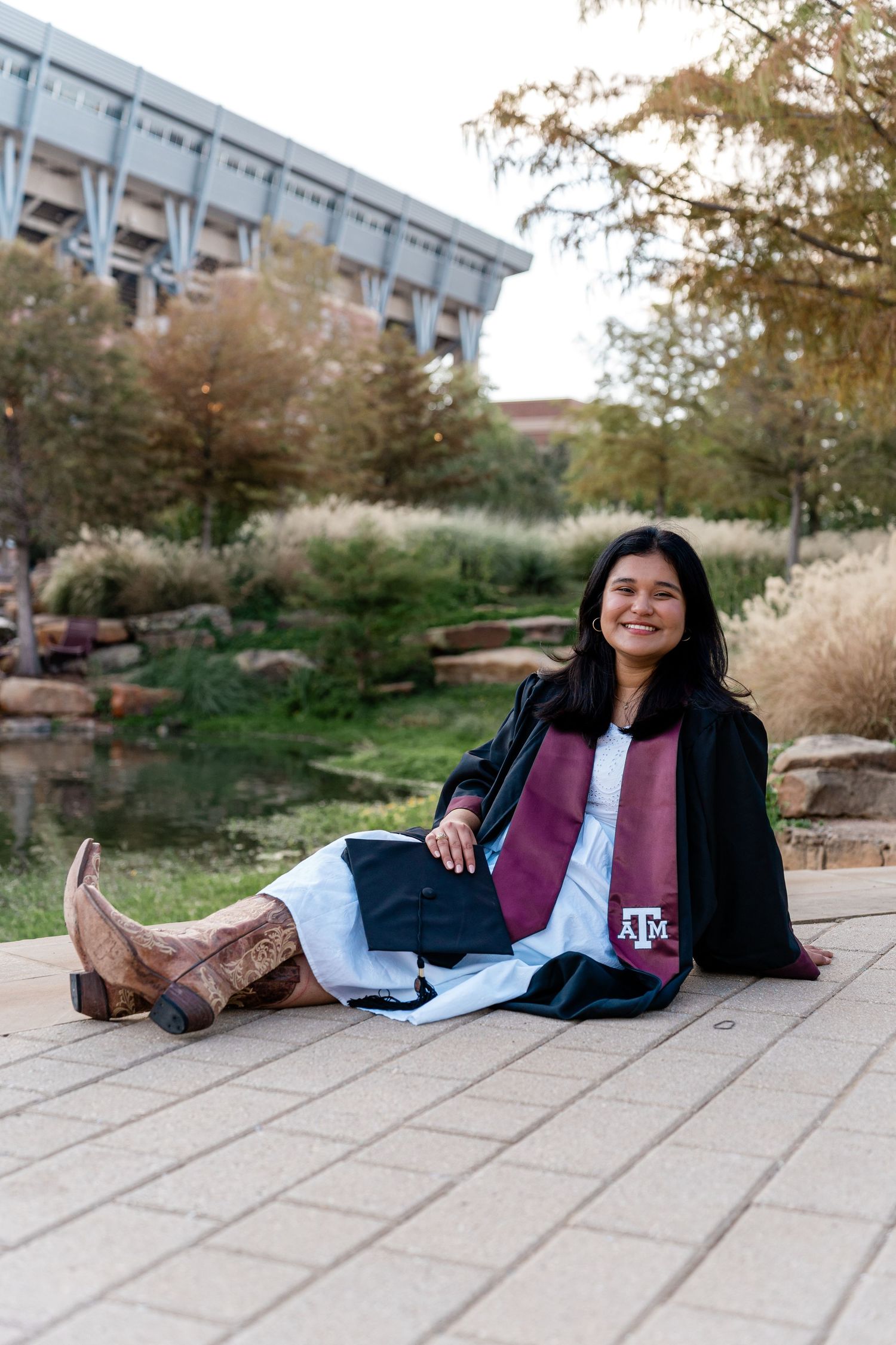 A series of five casual outdoor portrait photos showing someone lying on concrete steps in an urban park setting.