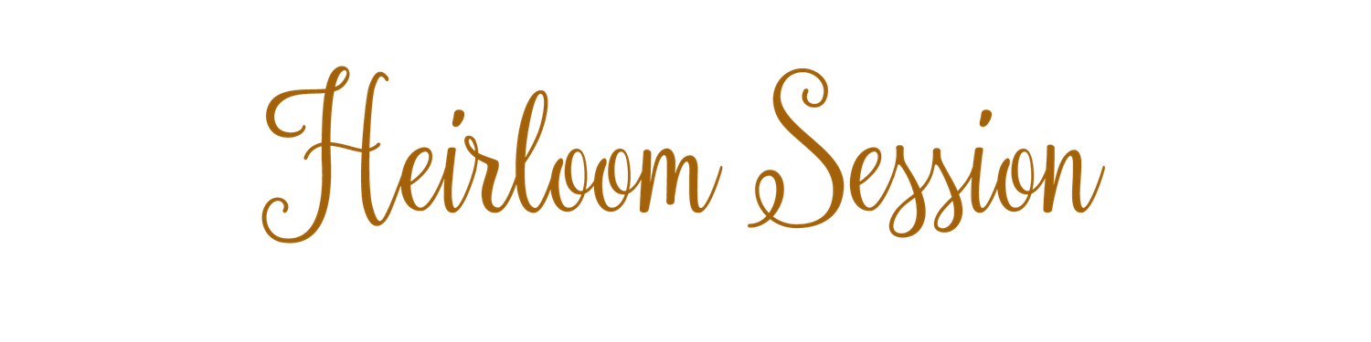 Elegant gold cursive script reading Heirloom Session on a white background.