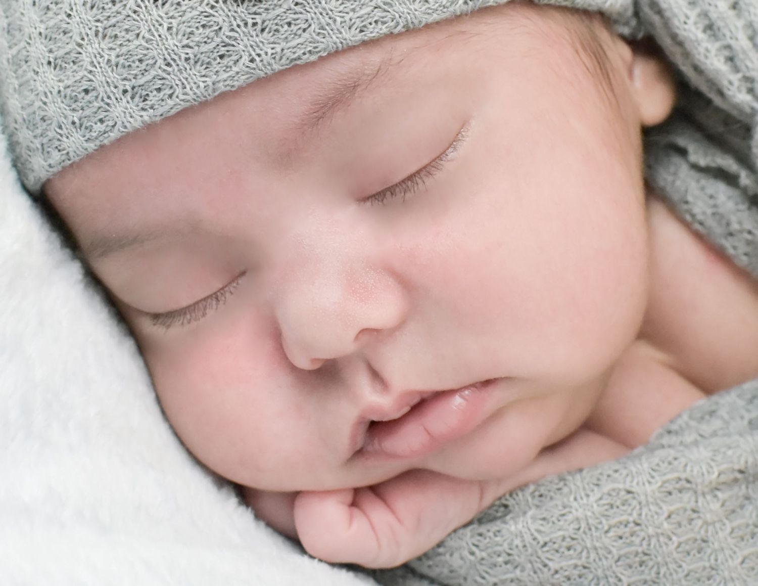 Peaceful newborn baby sleeping soundly. Newborn photography Precious Keepsakes Photography San Antonio, Texas