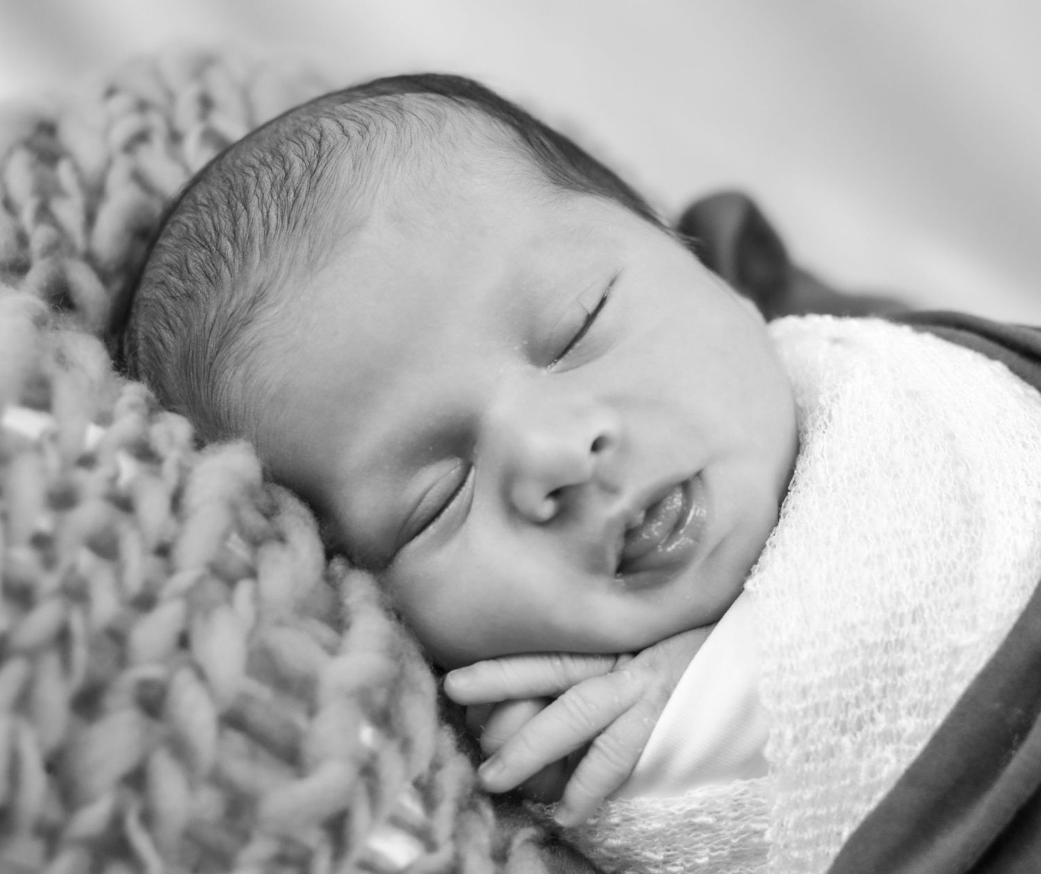 Black and white series of peaceful sleeping newborn portraits. San Antonio newborn photography