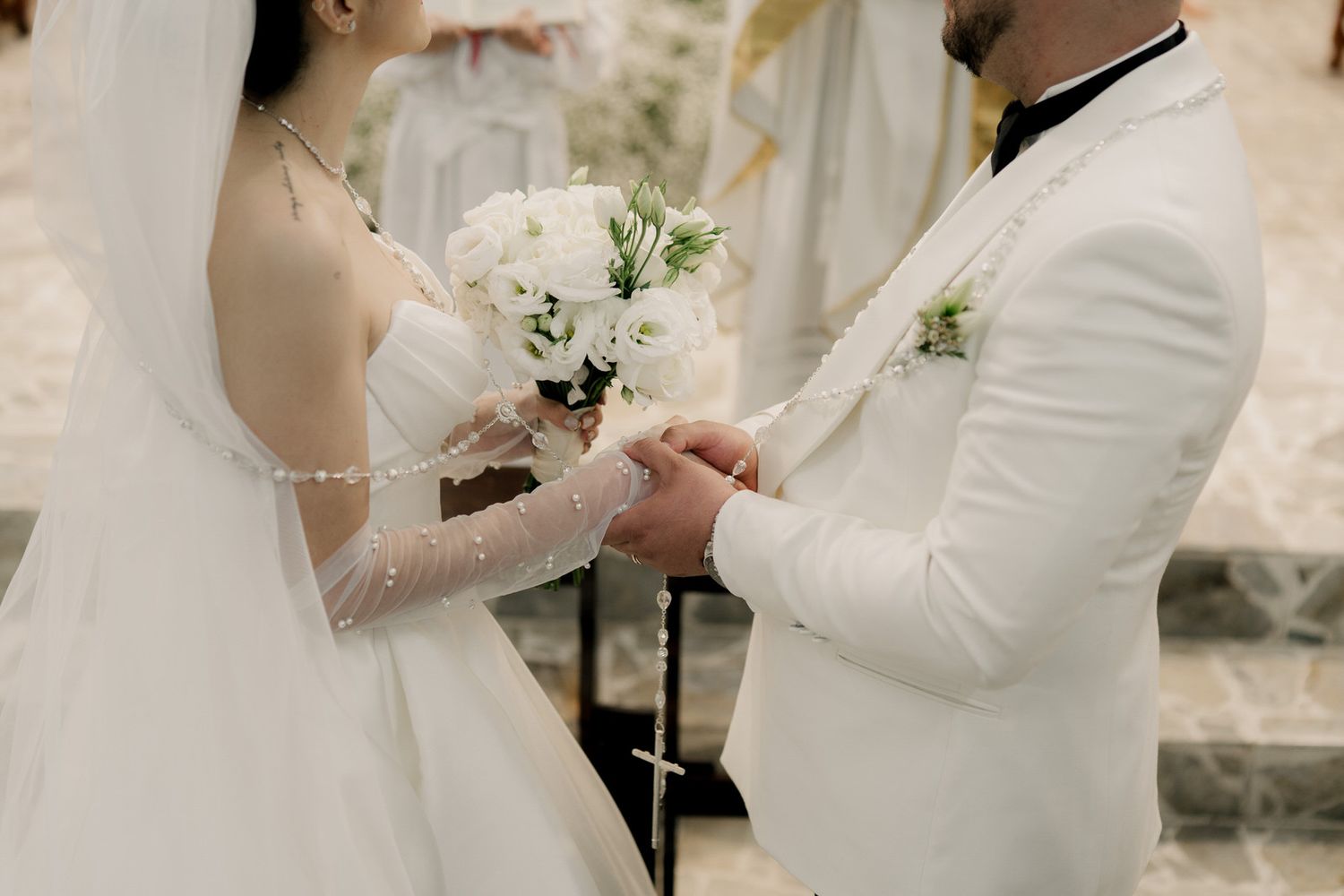 Tender moment between newlyweds during their wedding ceremony.