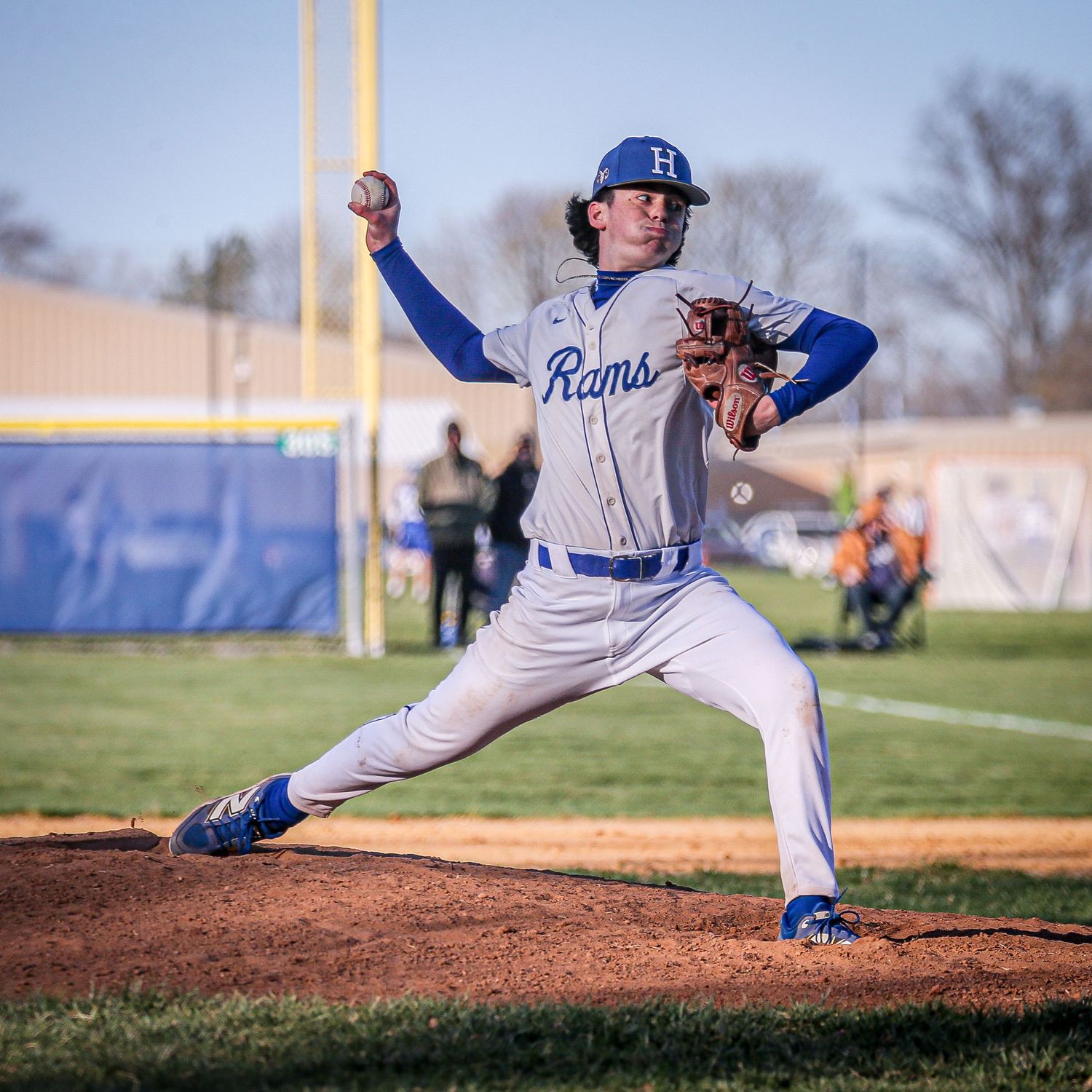 Highstown High School pitcher pitching the ball in Mercer County, New Jersey.