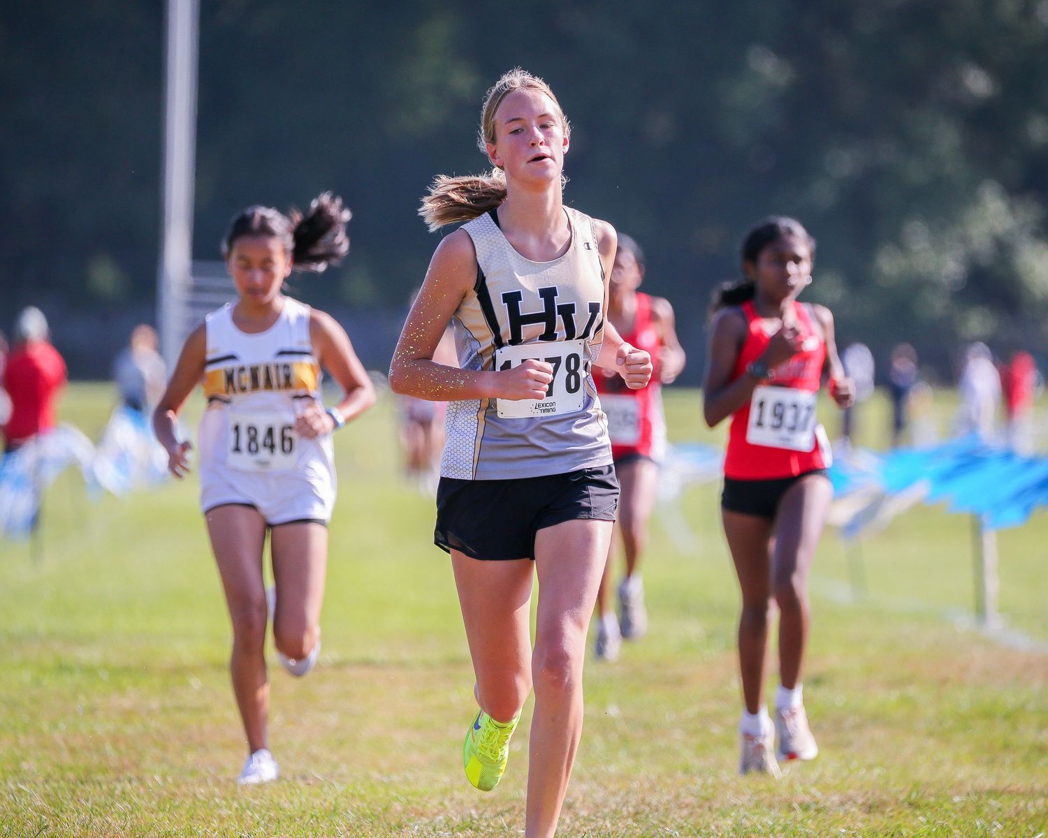 Hopewell Valley High School cross country athlete running race in Mercer County, New Jersey.