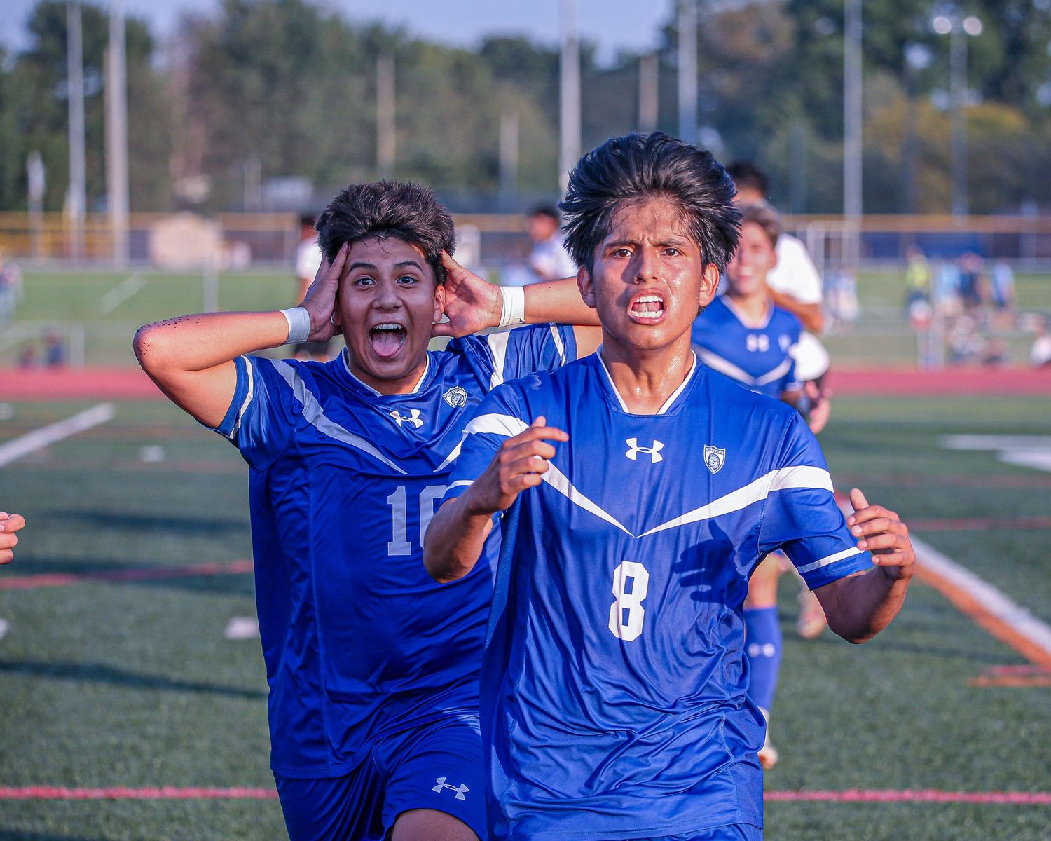 Hightstown High School varsity soccer players scoring the game winning goal in Mercer County, New Jersey.