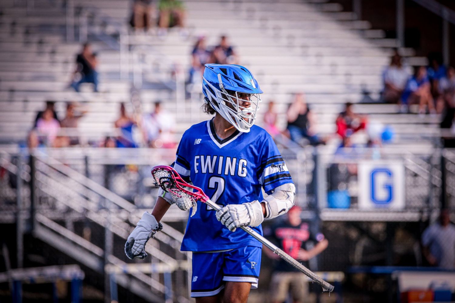 Ewing High School boys varsity lacrosse player playing in Mercer County, New Jersey.
