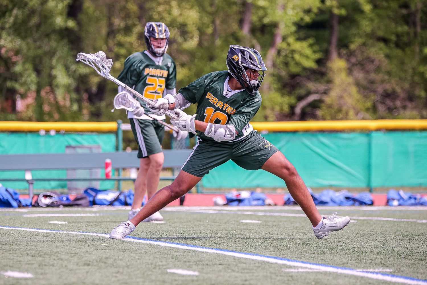 West Windsor Plainsboro South High School boys varsity lacrosse player shooting ball in Mercer County, New Jersey.