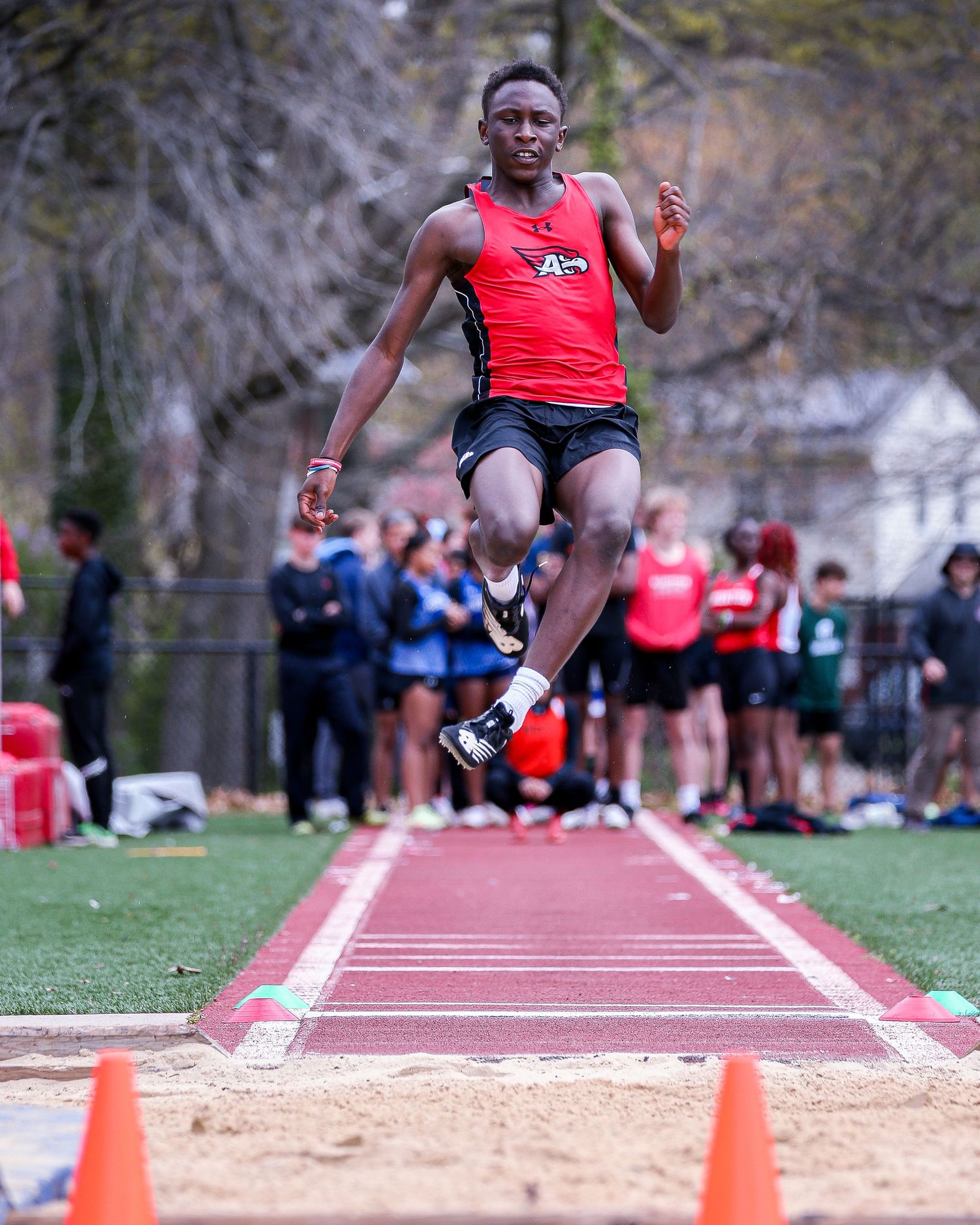 Track and field athele long jump at Lawrence High School in Mercer County, New Jersey.