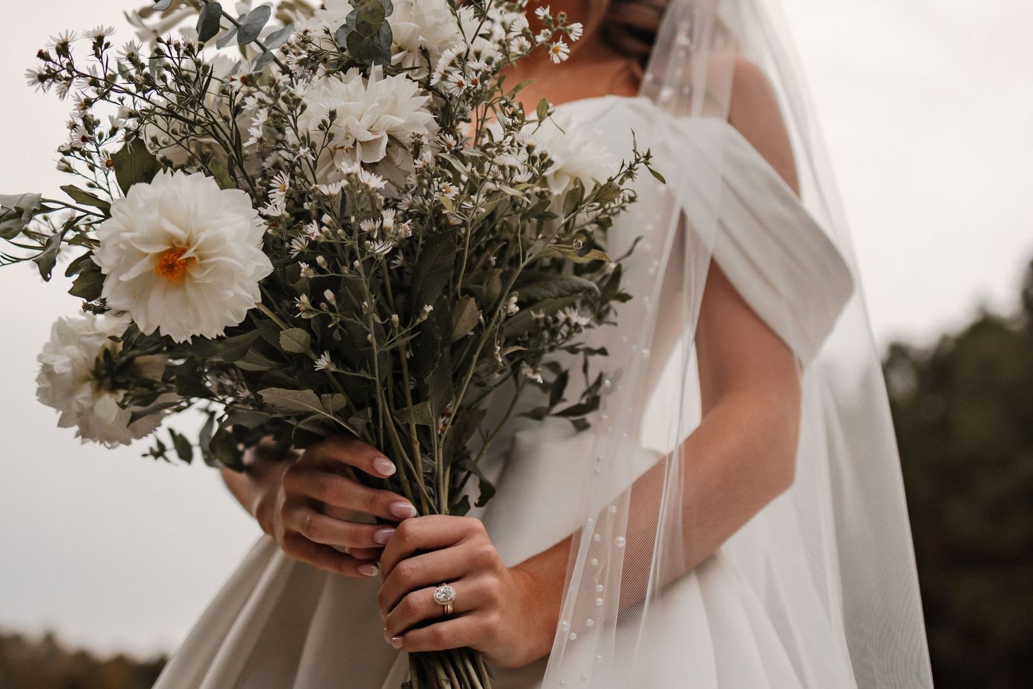 Close-up shots of delicate white flowers and bouquets against light background.