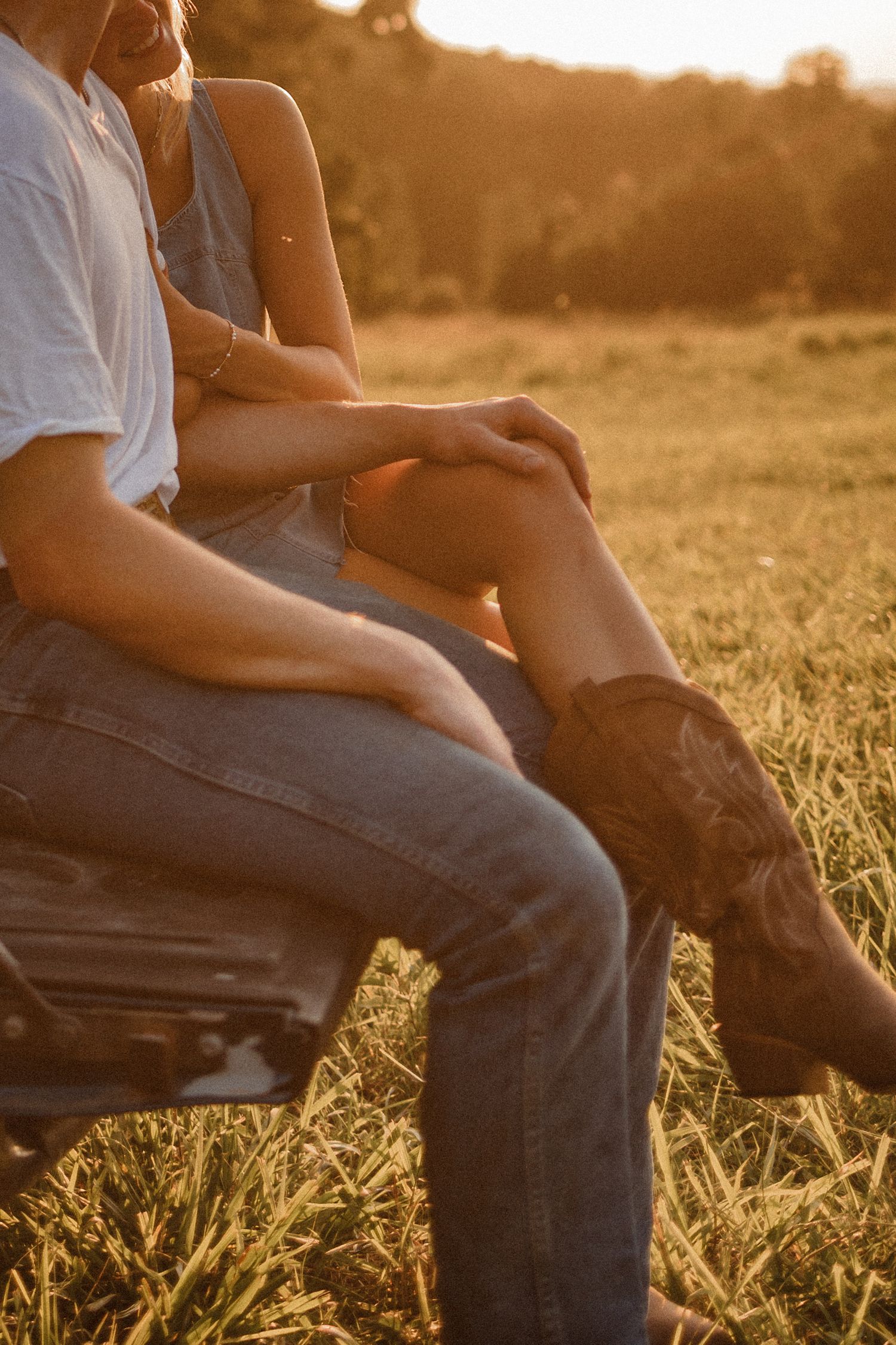 A sequence of cropped photos showing people sitting in a golden wheat field at sunset.