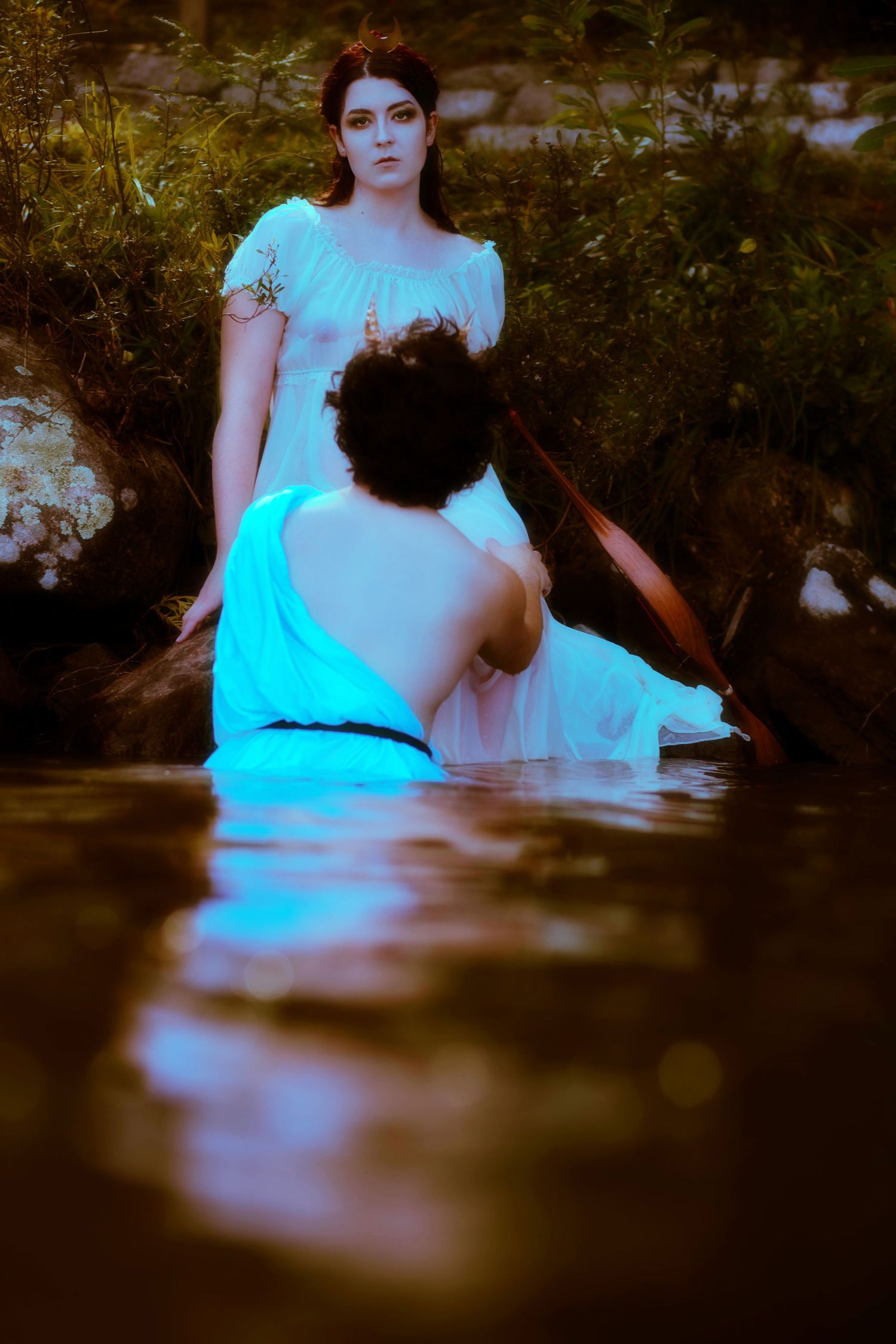 Mack (top) thrifted this beautiful gown and James (bottom) created her headpiece out of a broken earring instead of thro