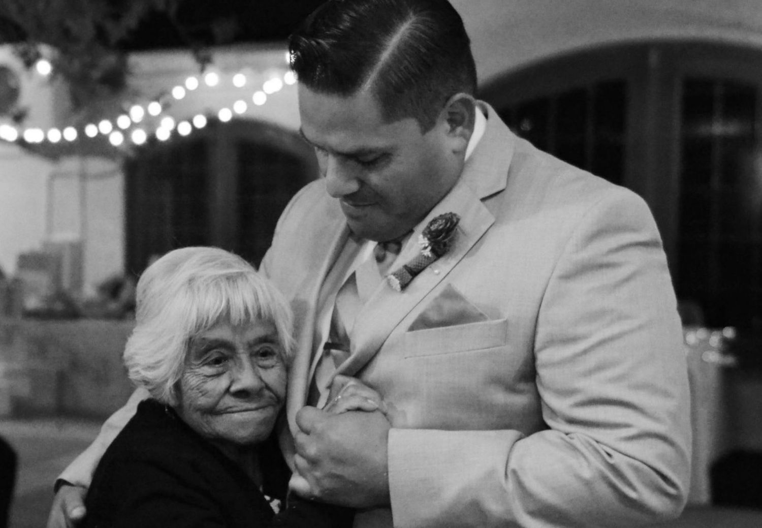 Ridgecrest Wedding groomsman dances with grandma