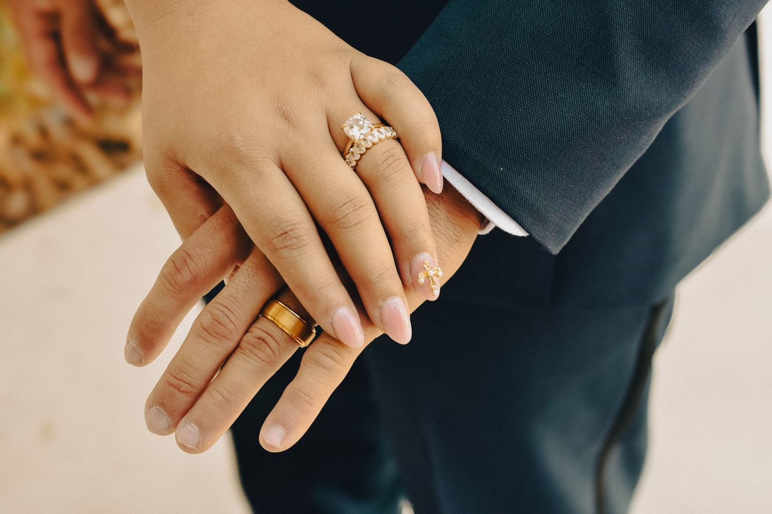 Couple in Visalia Ca hold hands