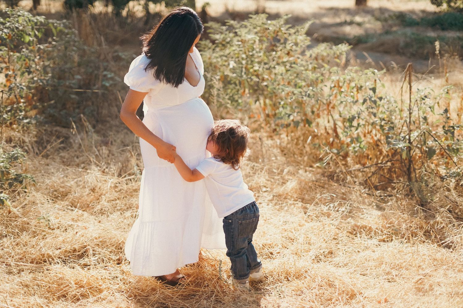 Maternity picture of woman in Exeter field cinematic