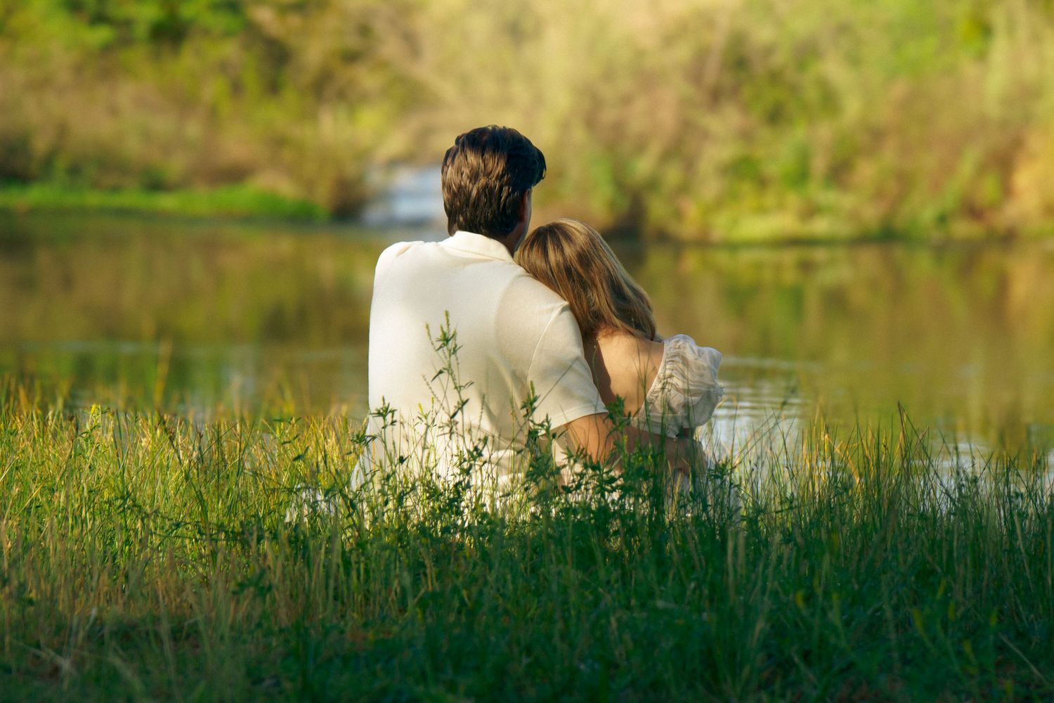 An engaged couple in front of Friant