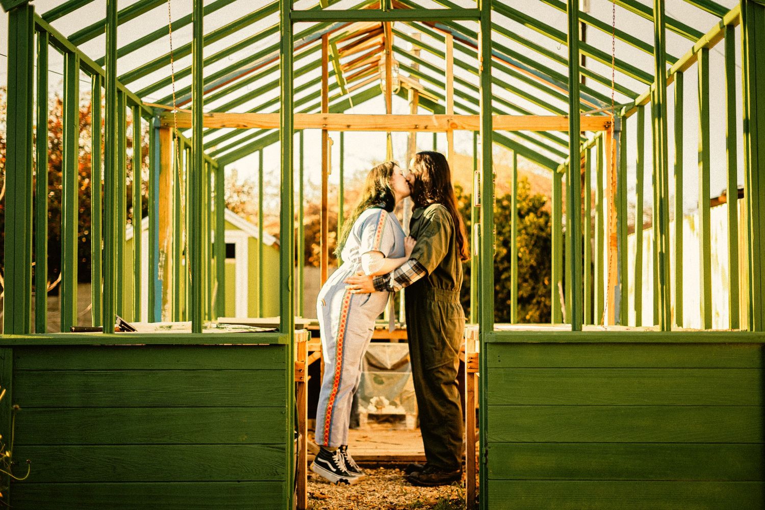 An engaged couple kiss in Bakersfield Ca