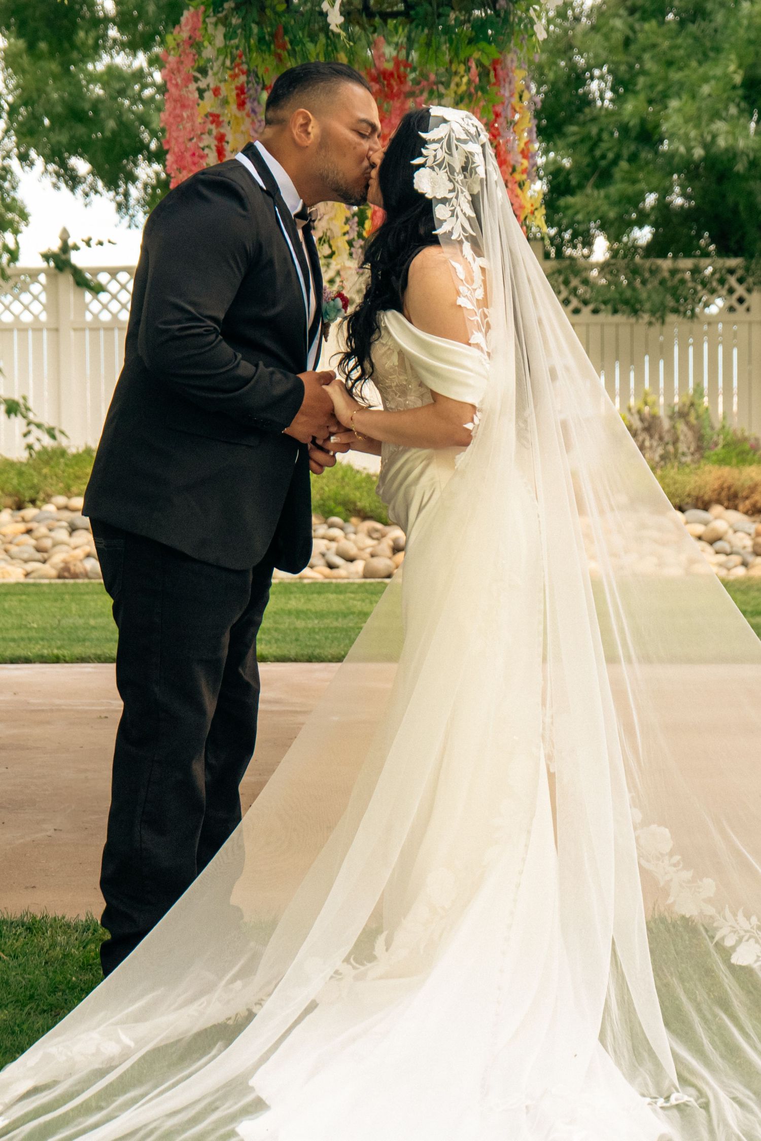 M Ranch Bride and groom Kiss