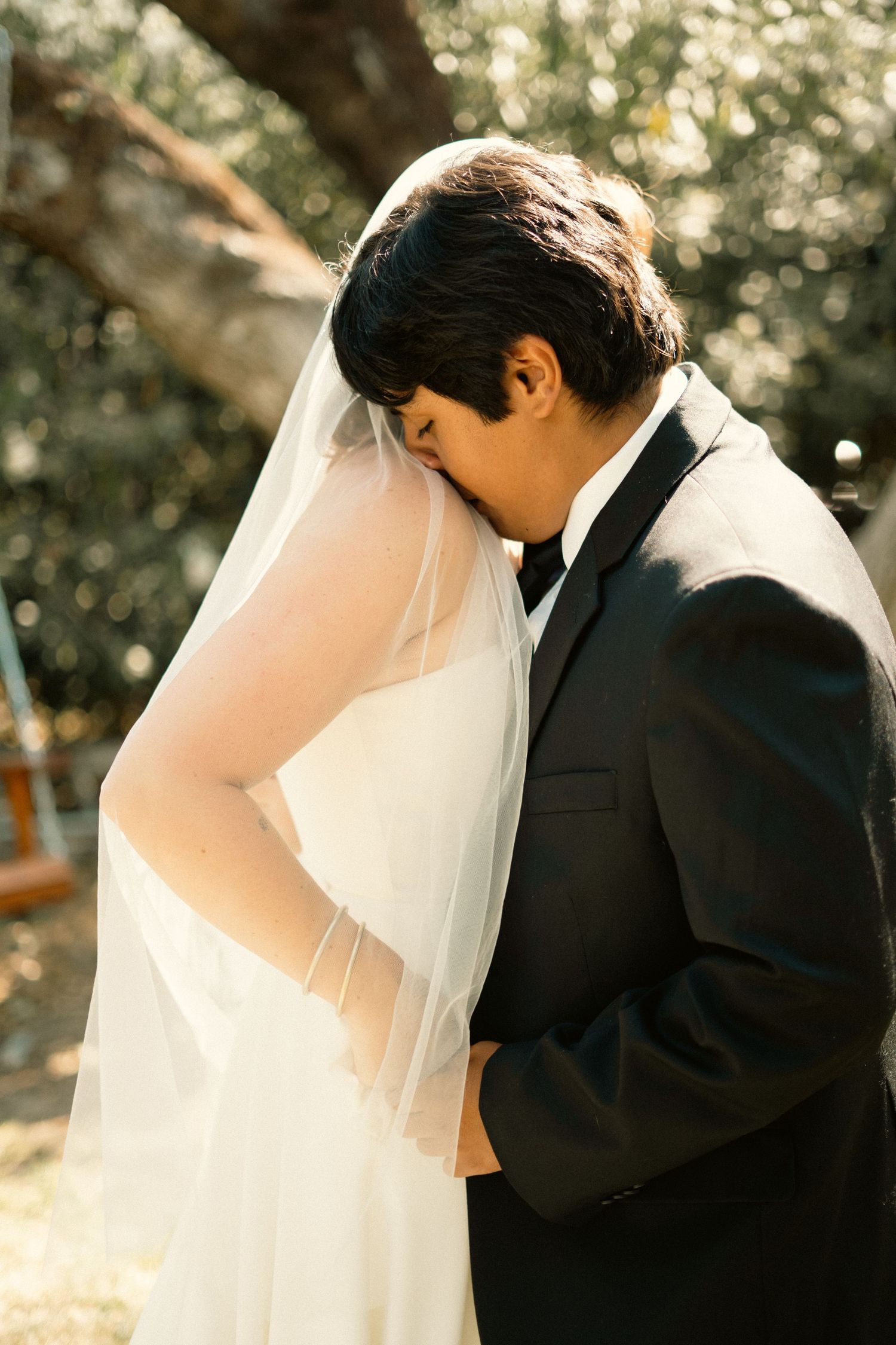 A newly married couple in a Sequoia Forest