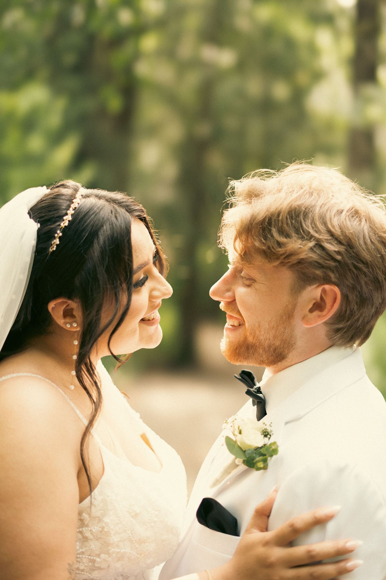 Cinematic photo of couple with greenery and bright spaces