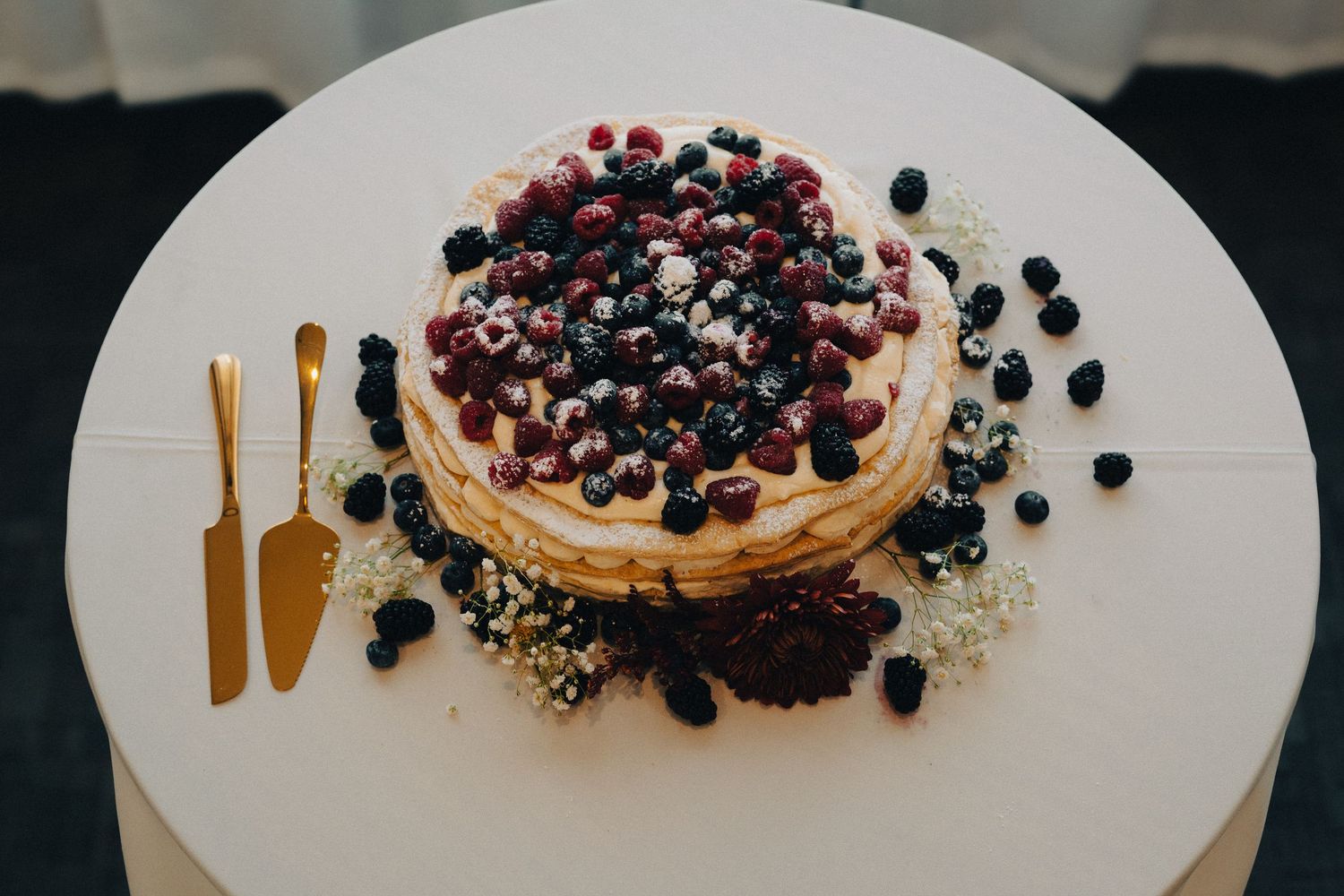 wedding cake with berries and sugar