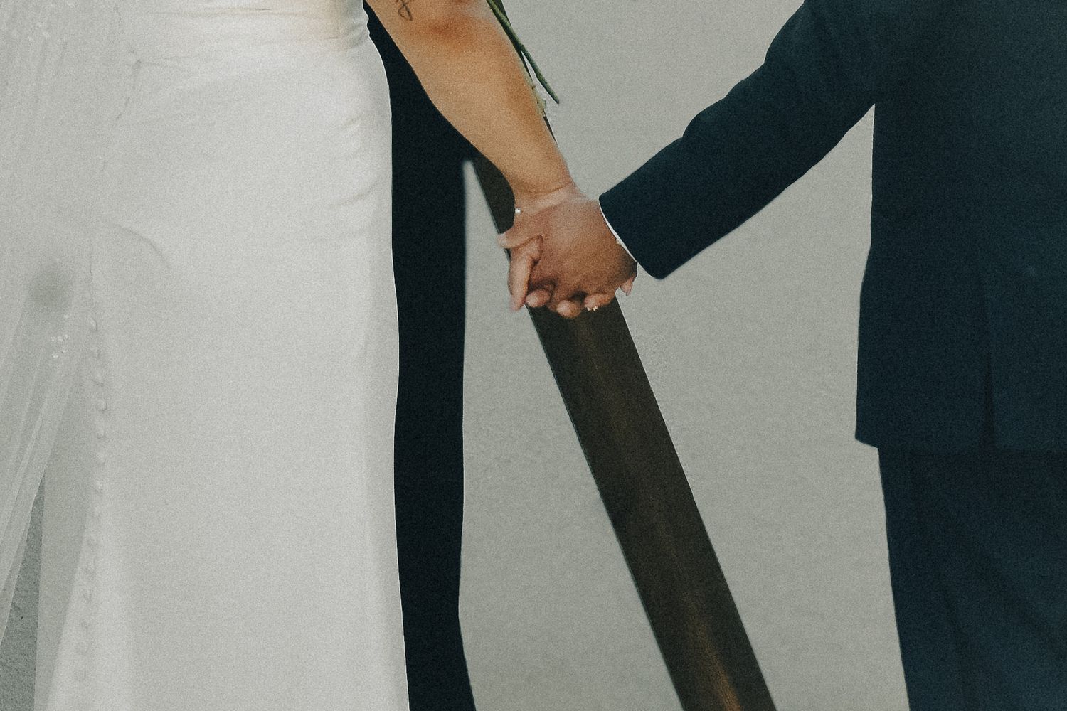 Couple in Visalia Ca hold hands