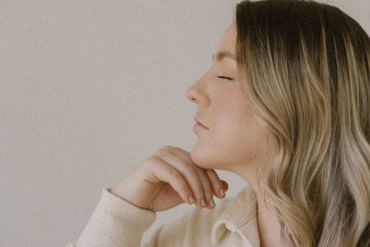 Ethereal portrait series showing gentle profile poses in soft lighting.