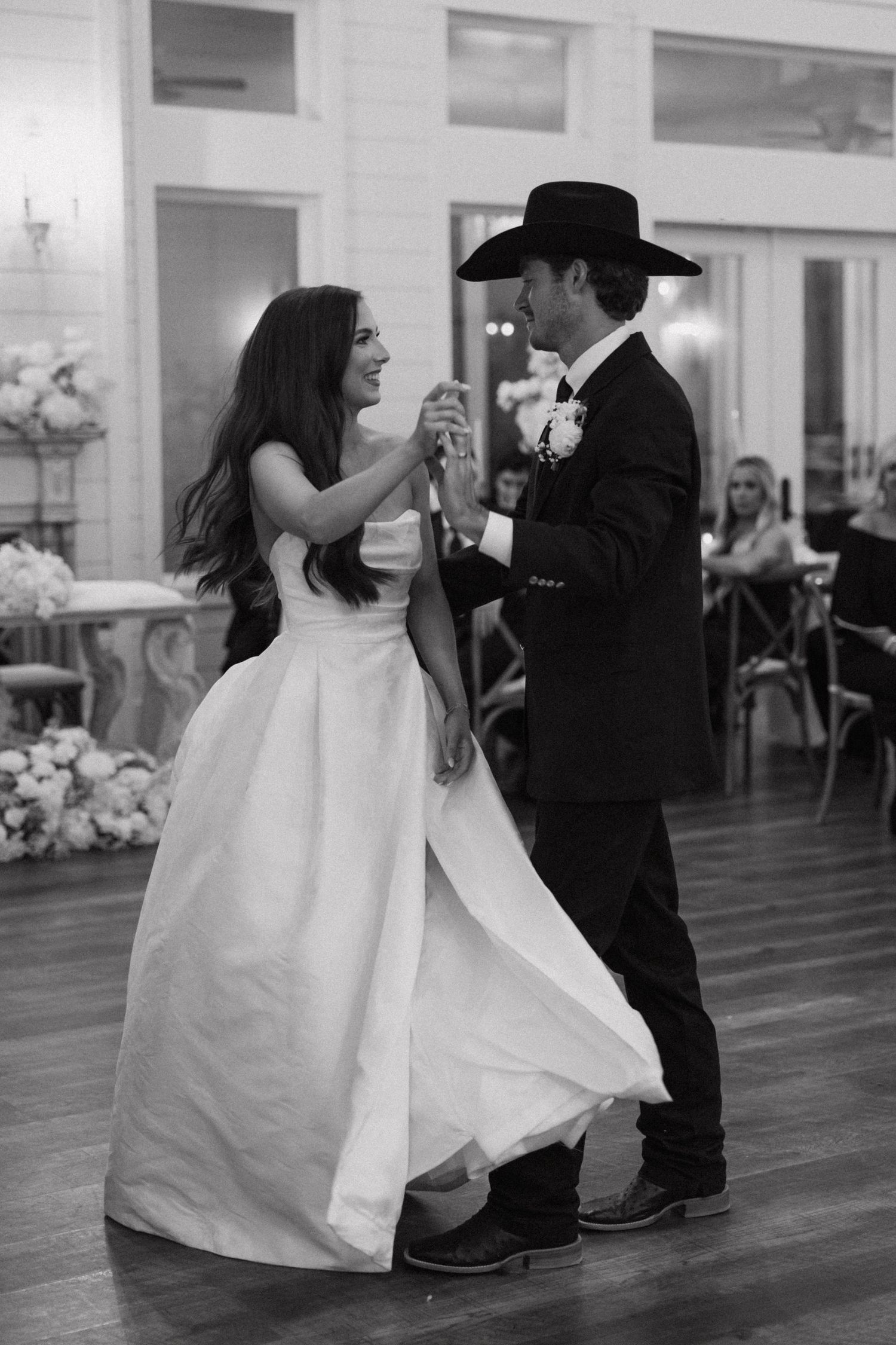 A black and white photo sequence shows a couple dancing, with the bride's white dress twirling across a wooden dance floor.