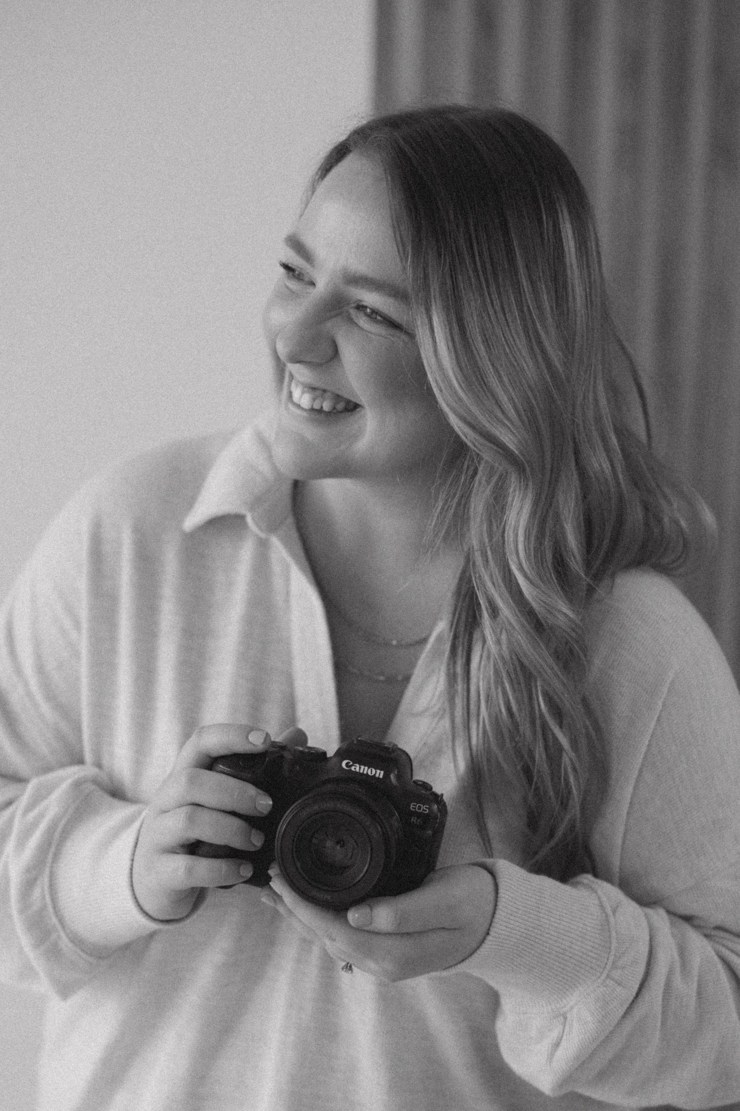 Candid photo series showing someone in white holding a camera and smiling.