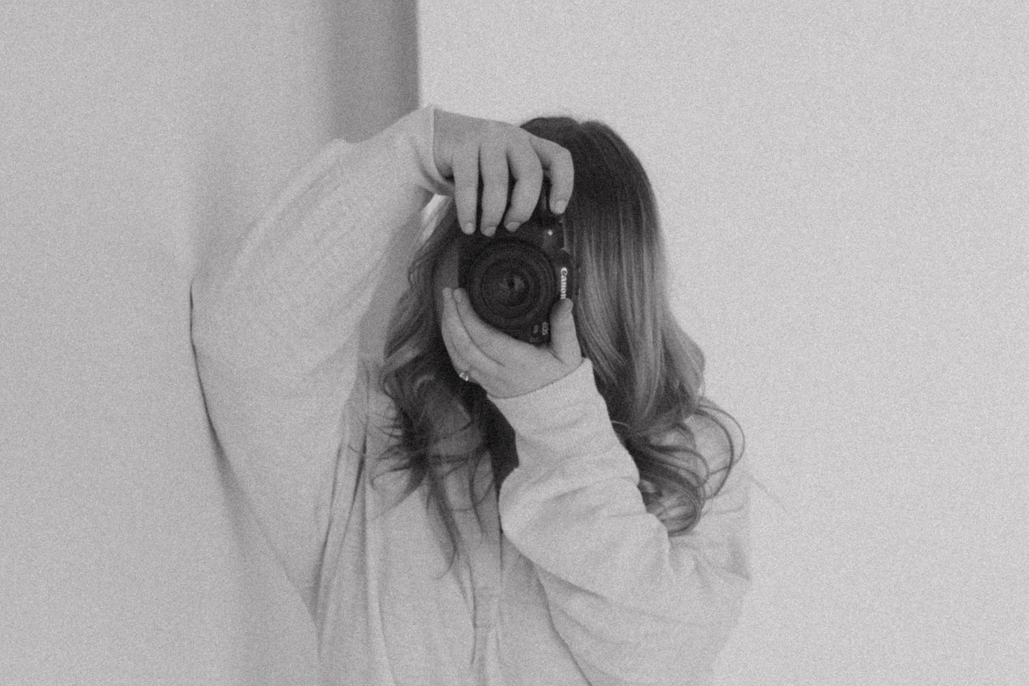 Minimalist black and white series showing artistic poses and movements.