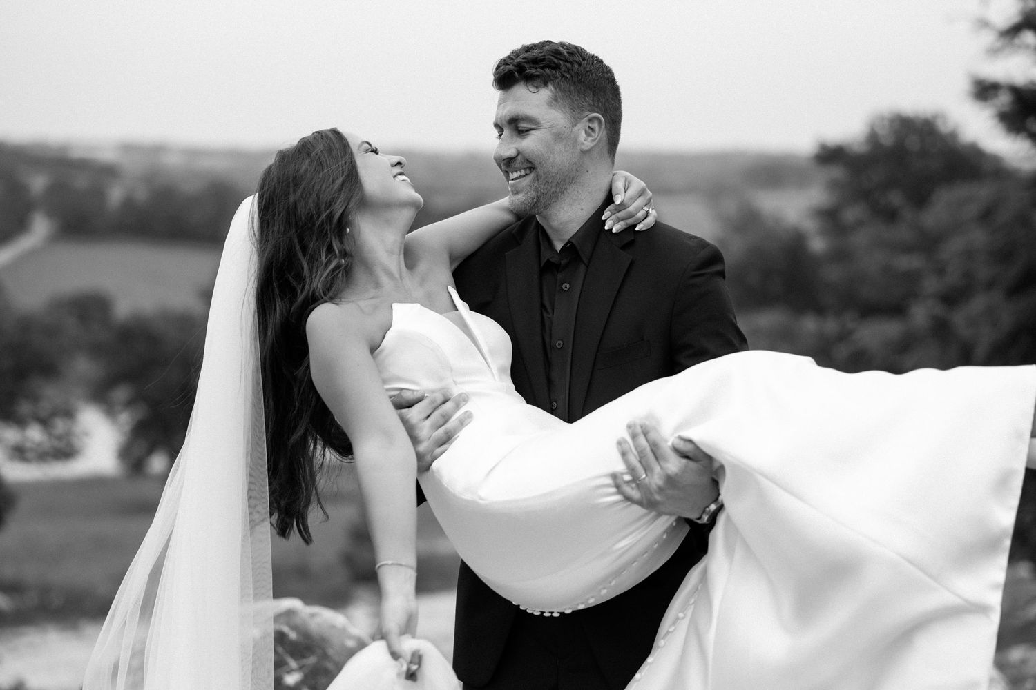A romantic black and white wedding photo collage showing intimate moments between a bride and groom.