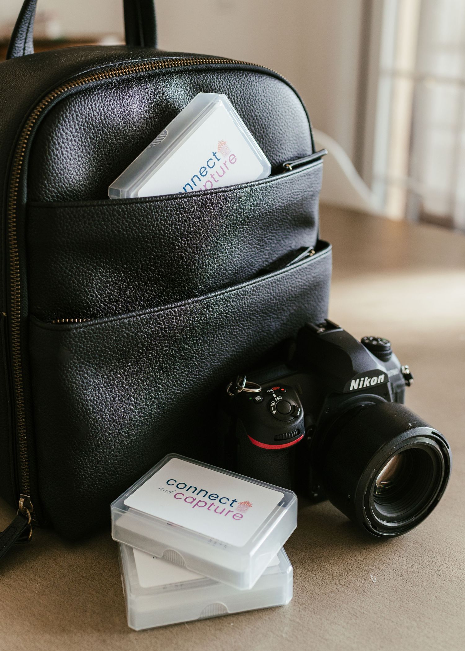 3 pack connect & capture in-home photography prompt deck with nikon camera in Kamrette camera bag