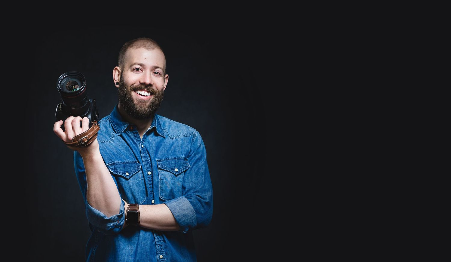 Studio portraits against black background with dramatic lighting.