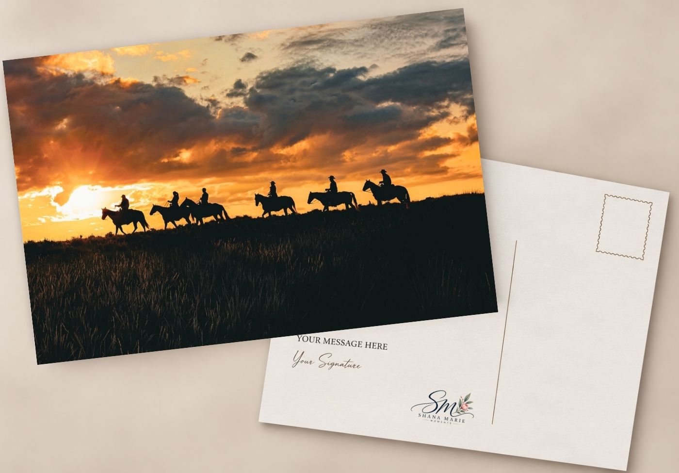Postcard featuring silhouetted horseback riders at sunset with dramatic clouds, shown front and back with signature lines.