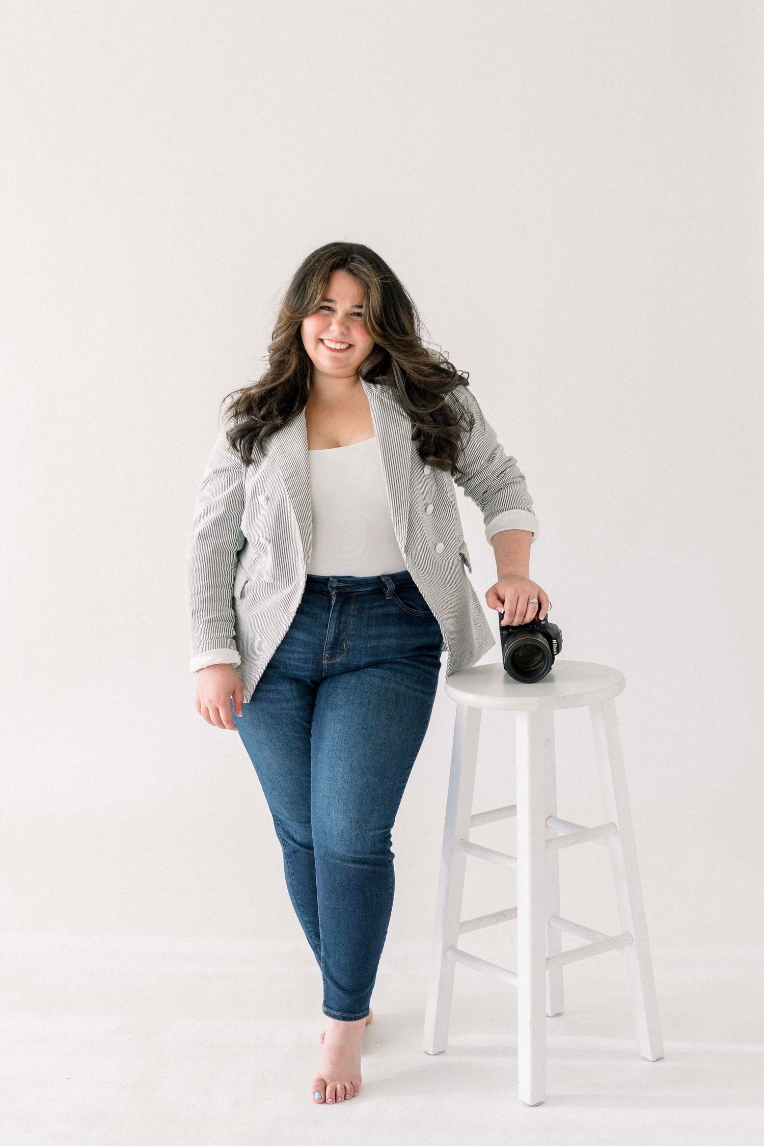 Fashion photography series showing casual business attire with denim and a gray blazer.