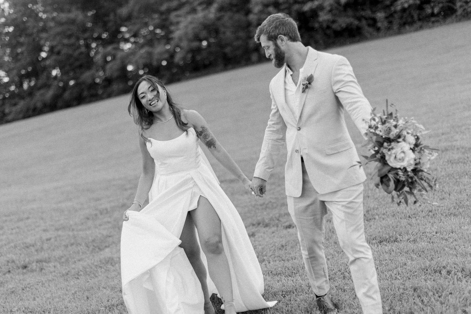 Black and white wedding photo series showing a couple walking and embracing in an outdoor garden setting.