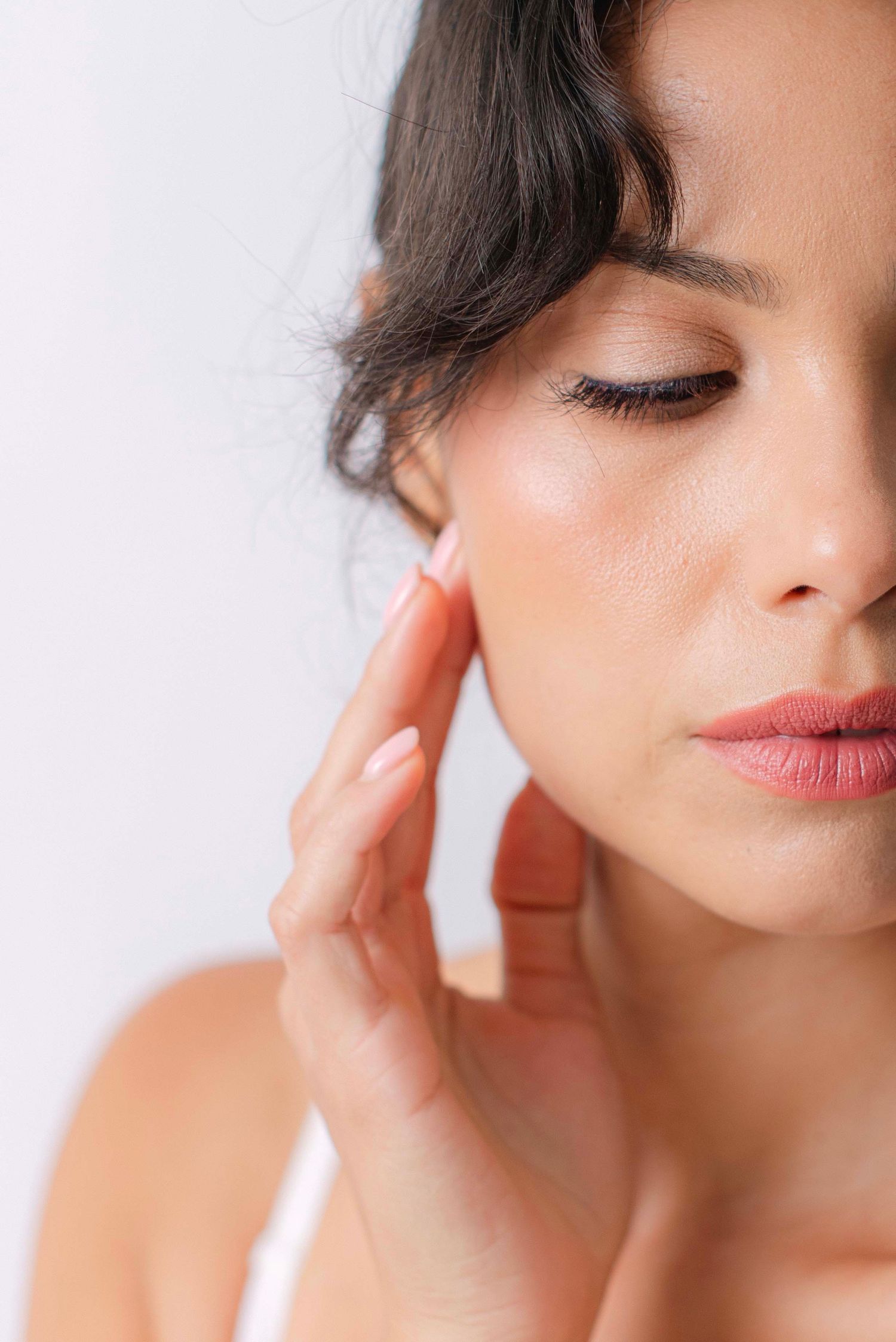 Close-up beauty shots showing soft skin texture and natural makeup details.