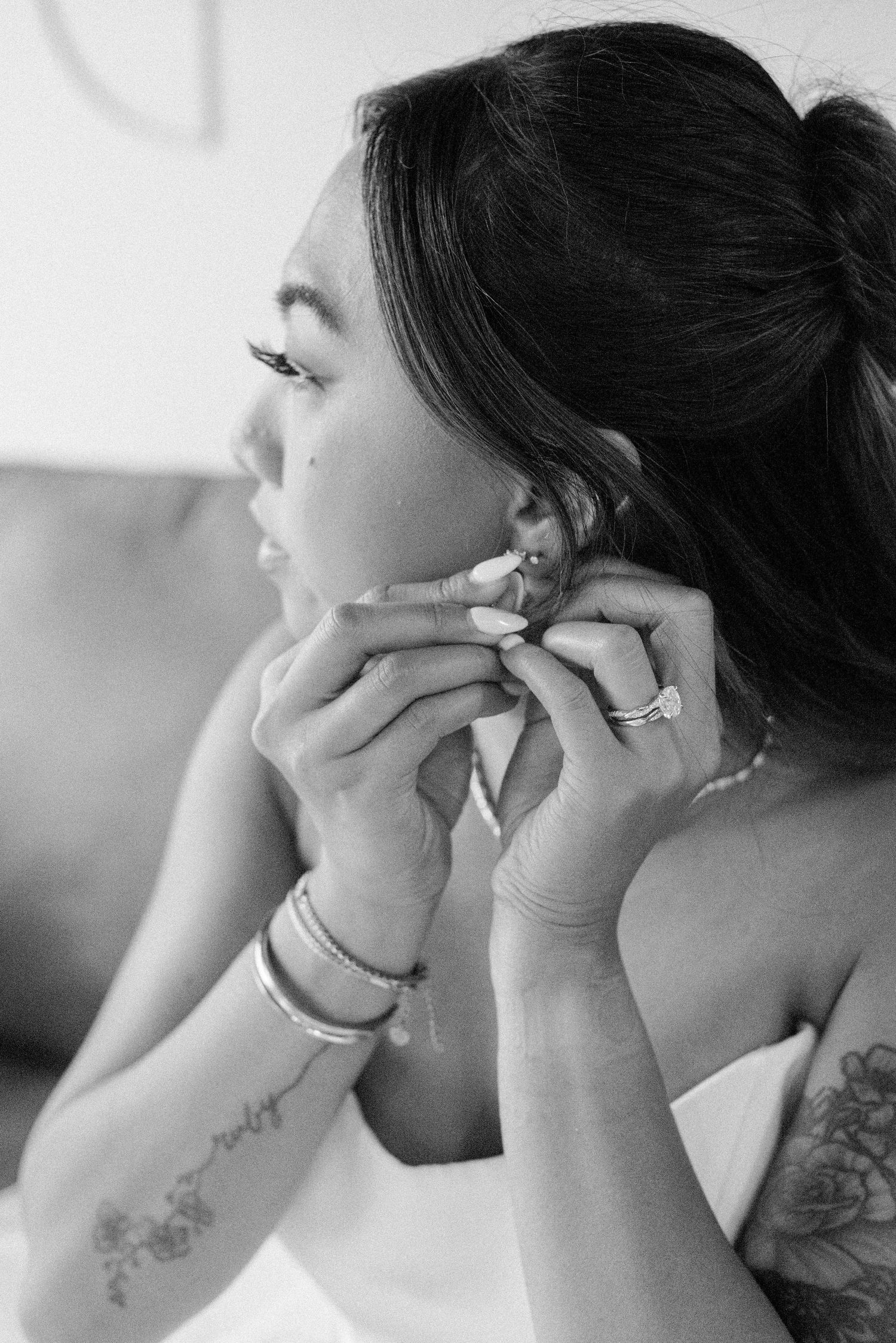 Black and white close-up photos showing emotional expressions and hand gestures in a sequence.