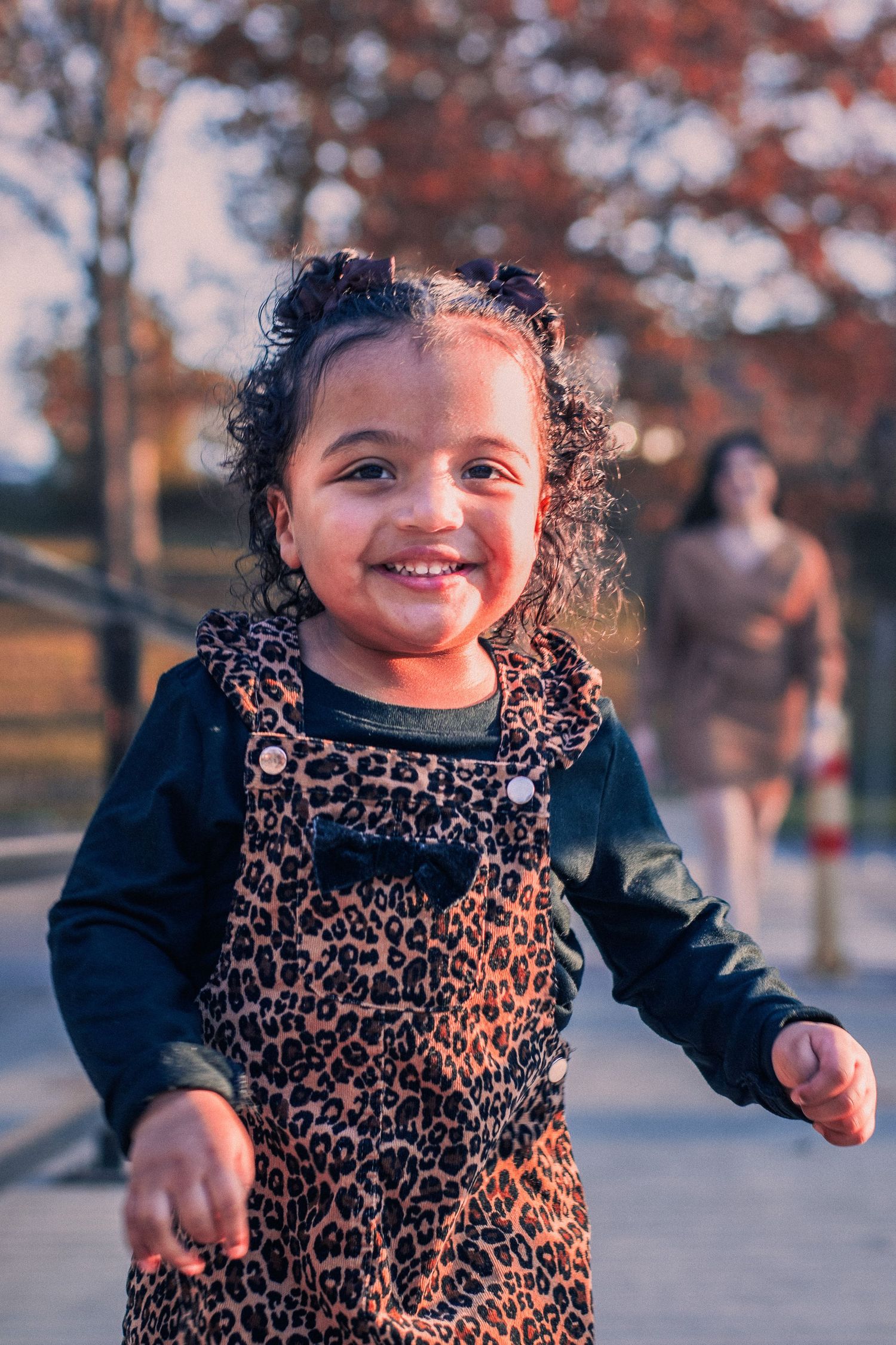 Toddler running towards camera