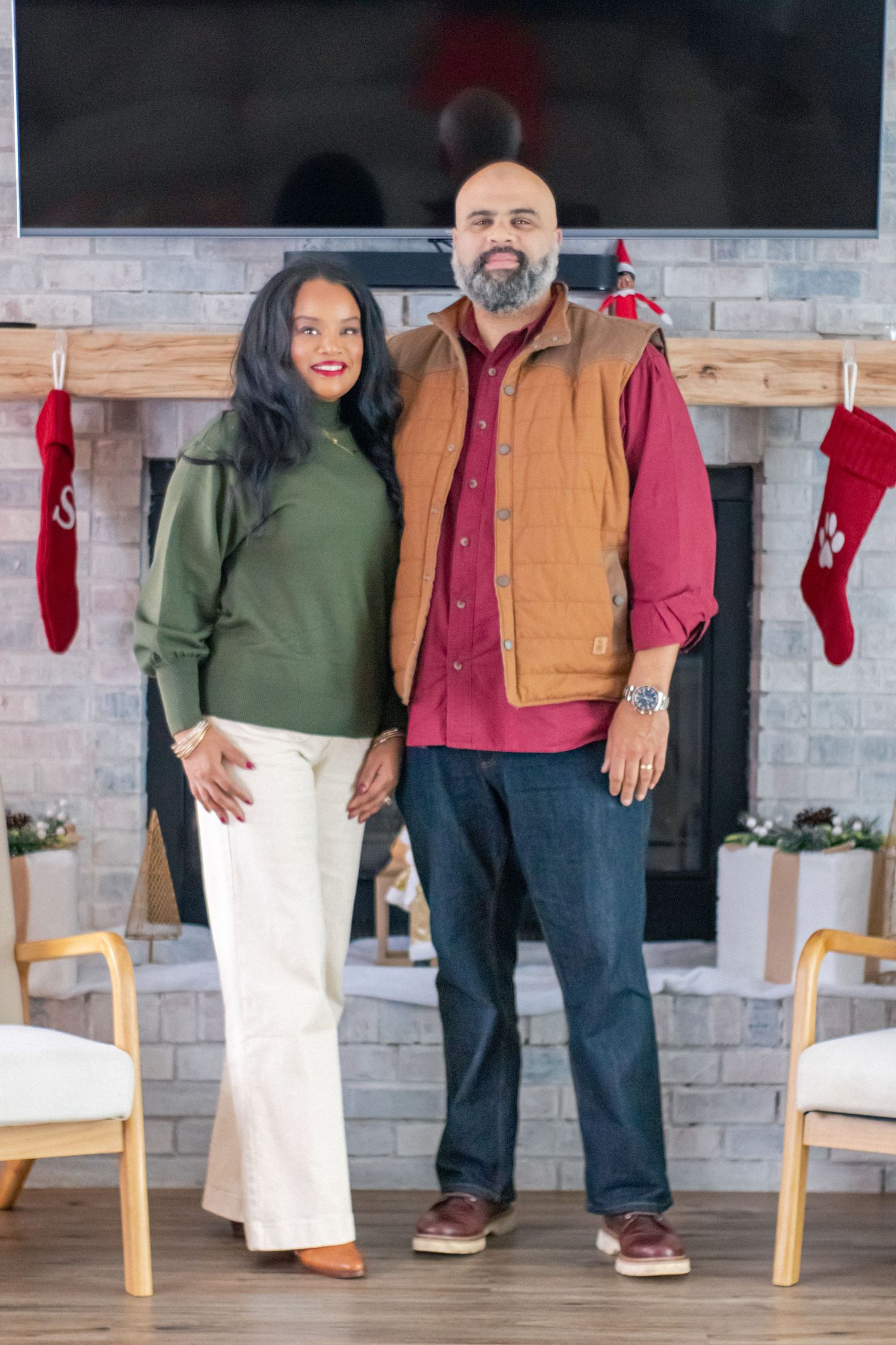 Couple standing near fire place