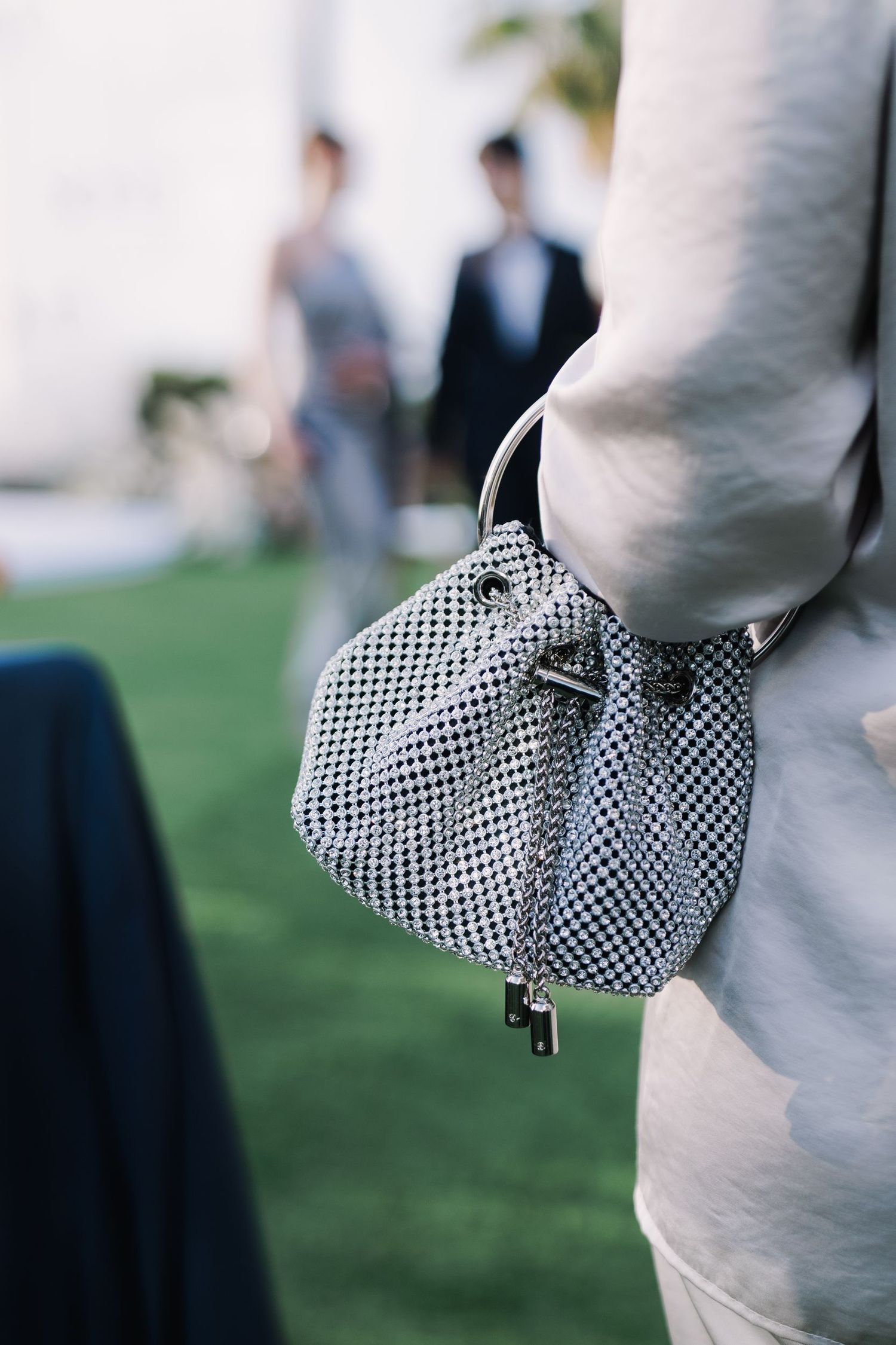 A black and white polka dot bowtie accessory shown in detail against a light background.