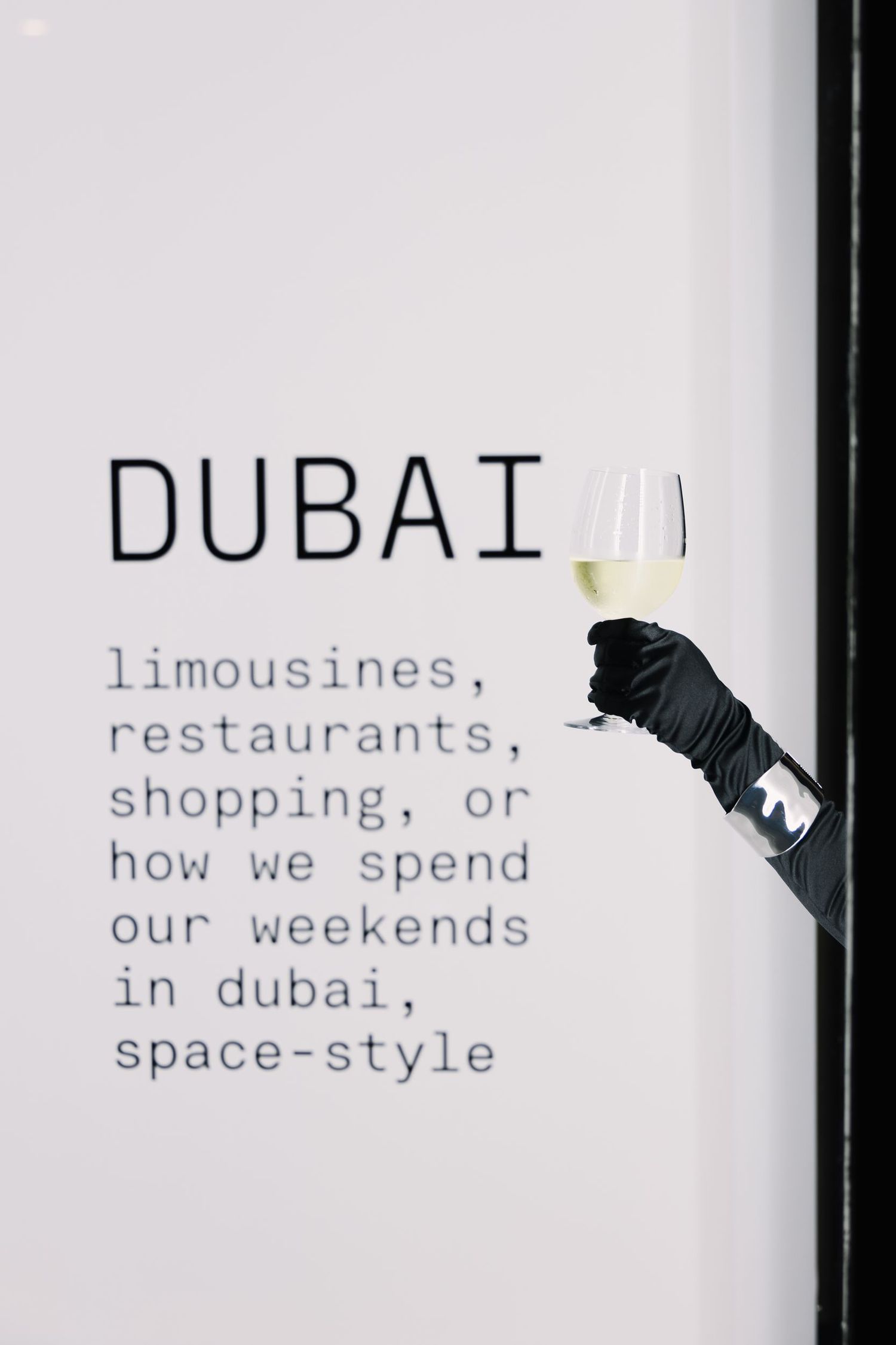 Close-up of typographic display text about Dubai lifestyle and entertainment.