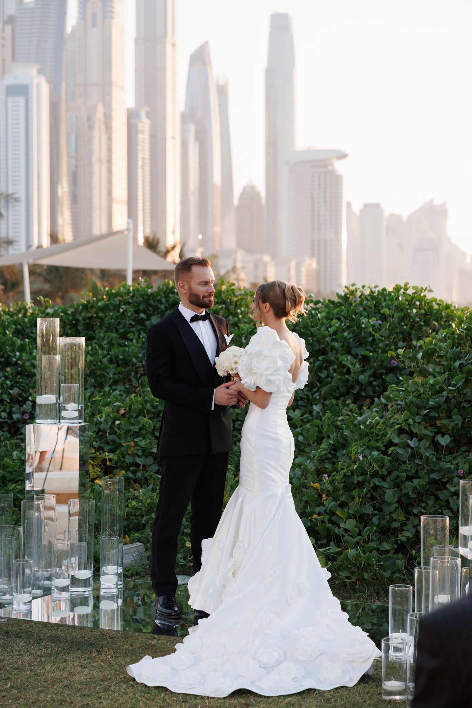 Elegant wedding dance sequence with a dramatic white gown against Dubai's skyline.