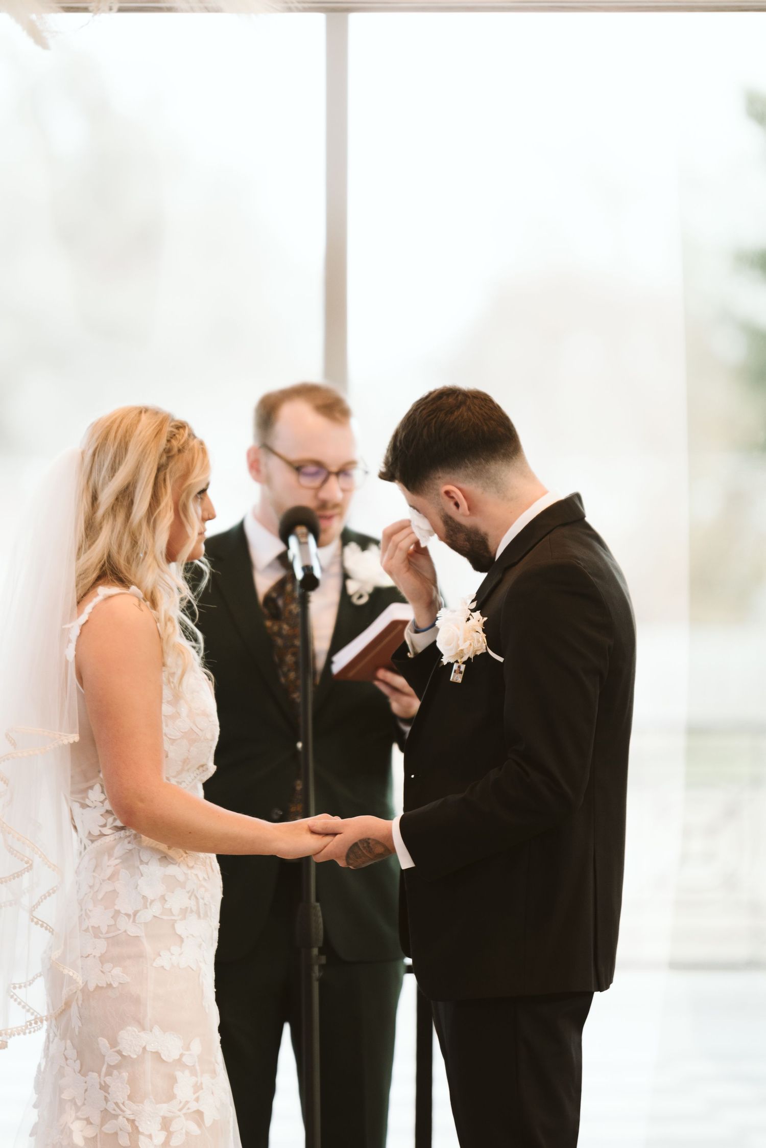 Groom emotional at wedding ceremony